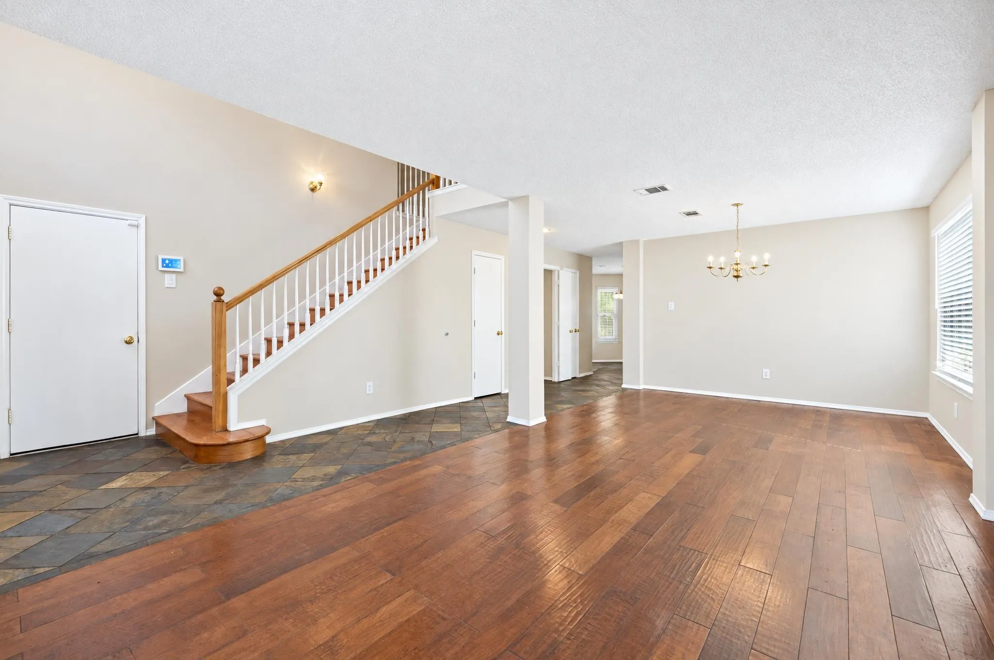 Spacious living, dining areas or flex spaces showcase beautiful hardwood flooring, creating a warm and inviting setting that flows seamlessly for everyday living and entertaining.
