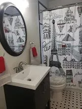 Black and White Floor Tile & Tub Surround