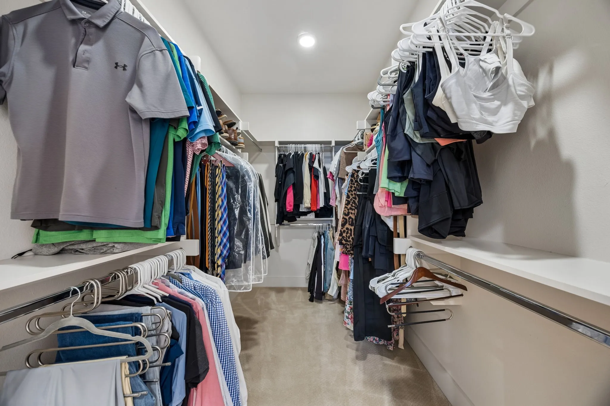 primary Closet is spacious and professionallu organized