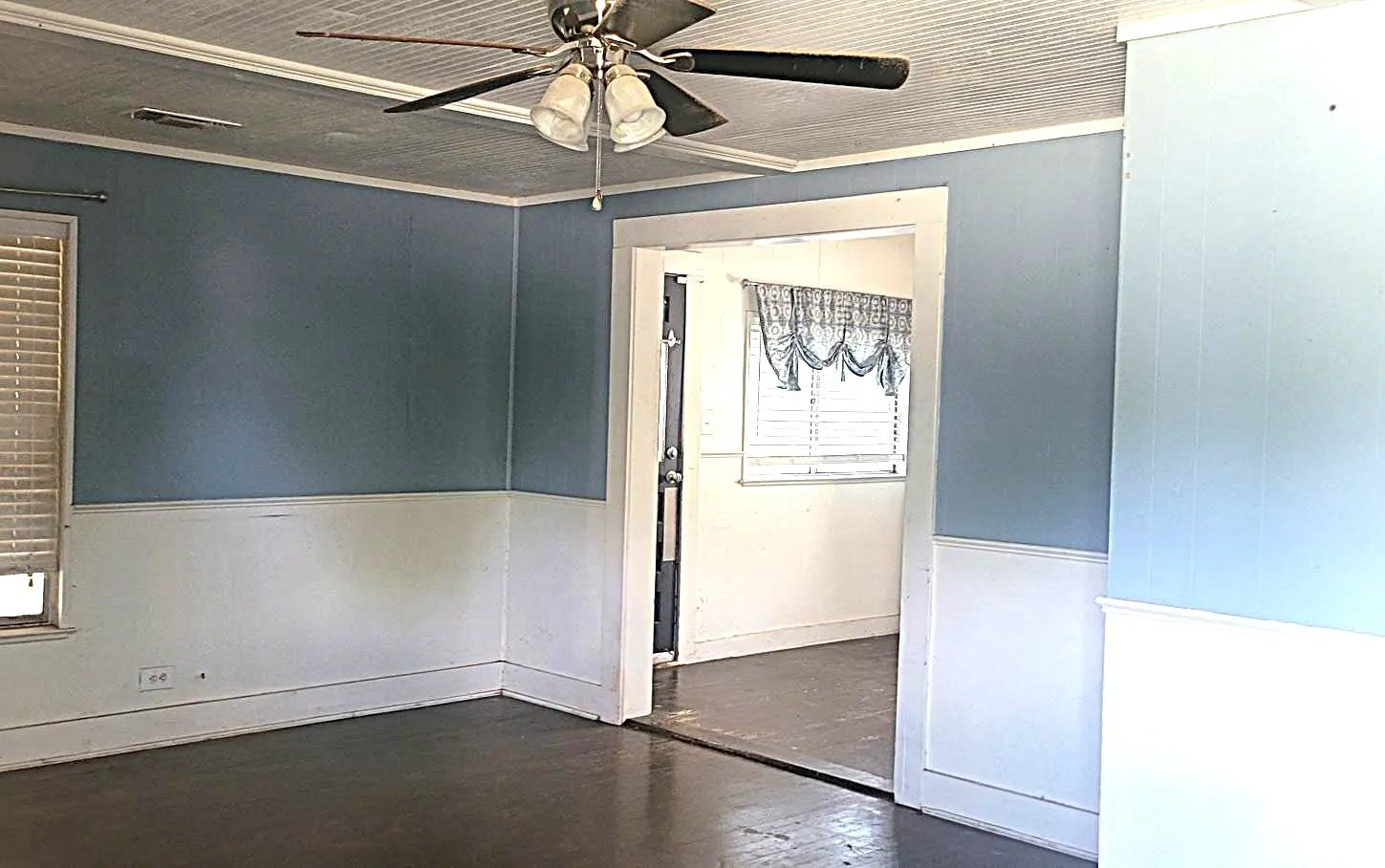 Living room looking into kitchen