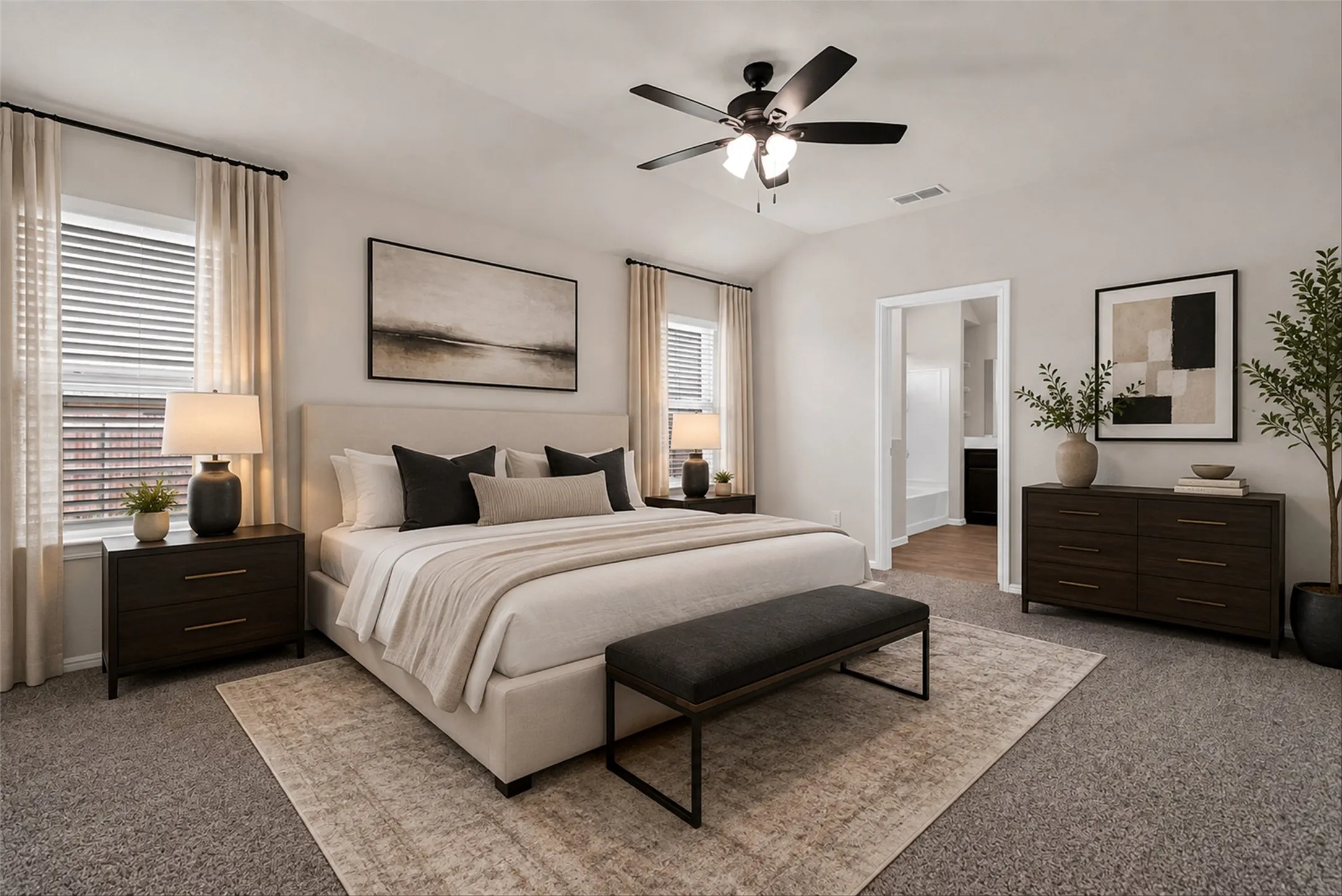 Vaulted ceiling, ceiling fan, recessed lighting, carpeted flooring, and a framed doorway