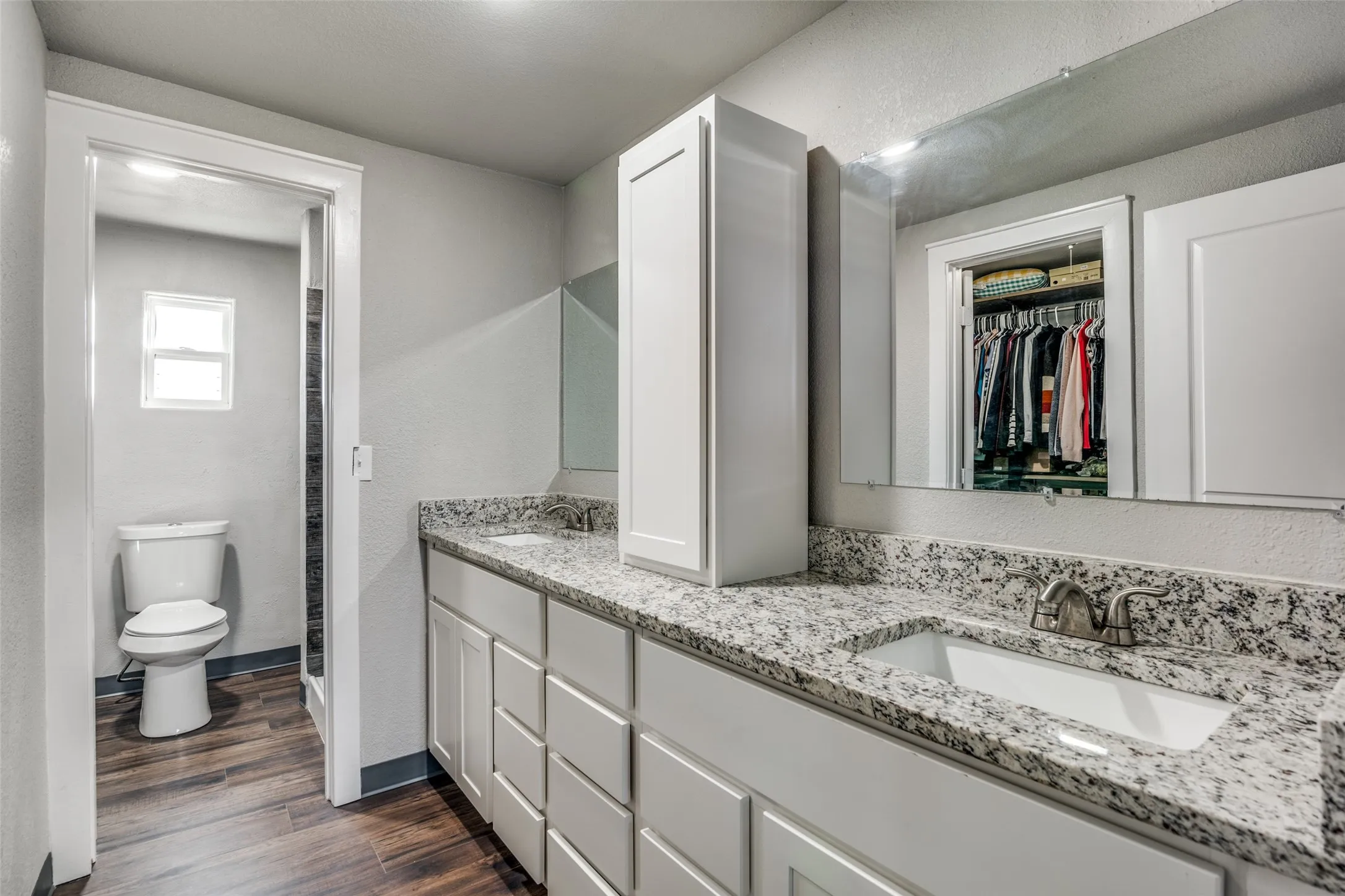 Master bathrrom with granite countertops and brushed nickle fixtures.