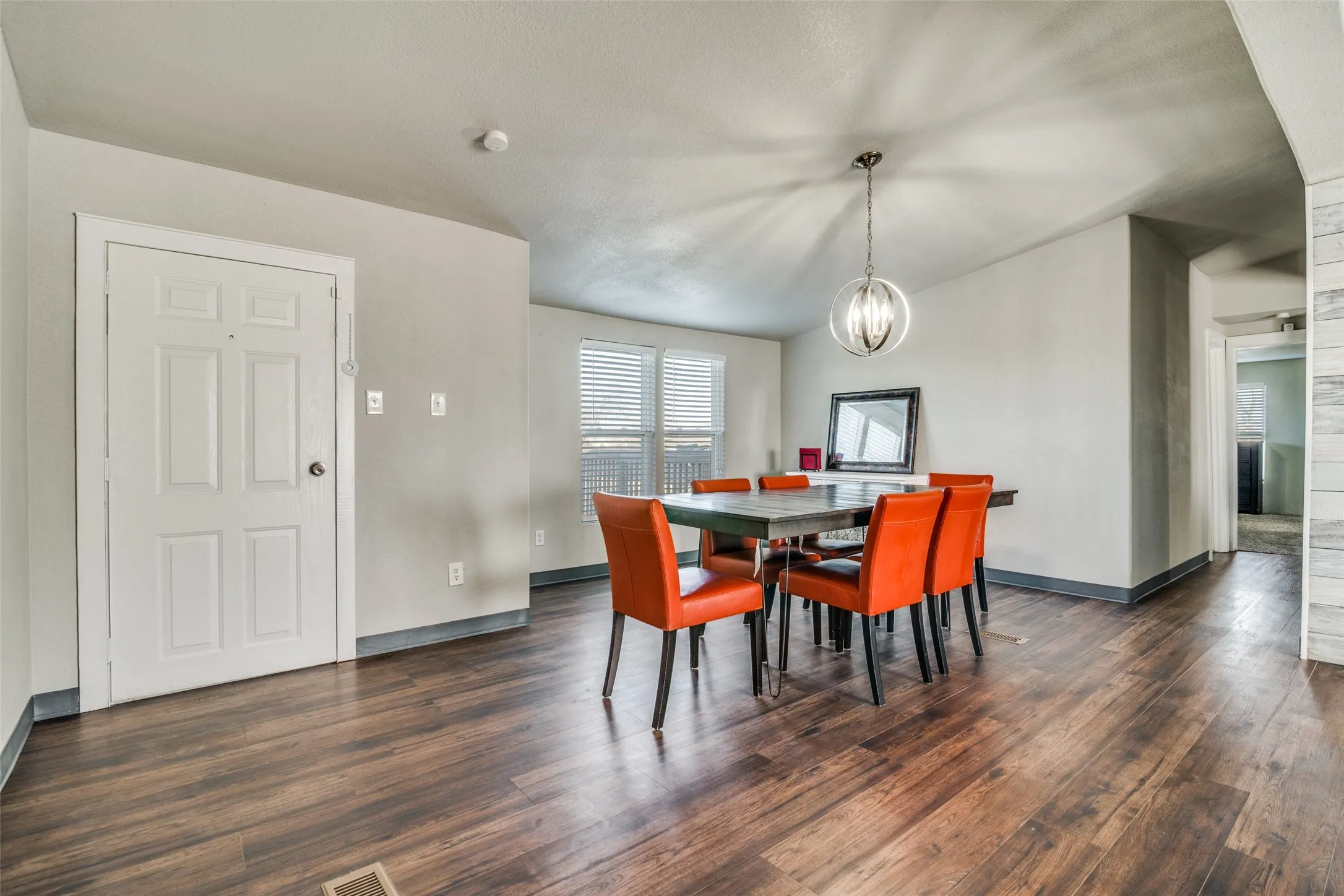 Large dining area with optional office space currently occupied by a buffet.