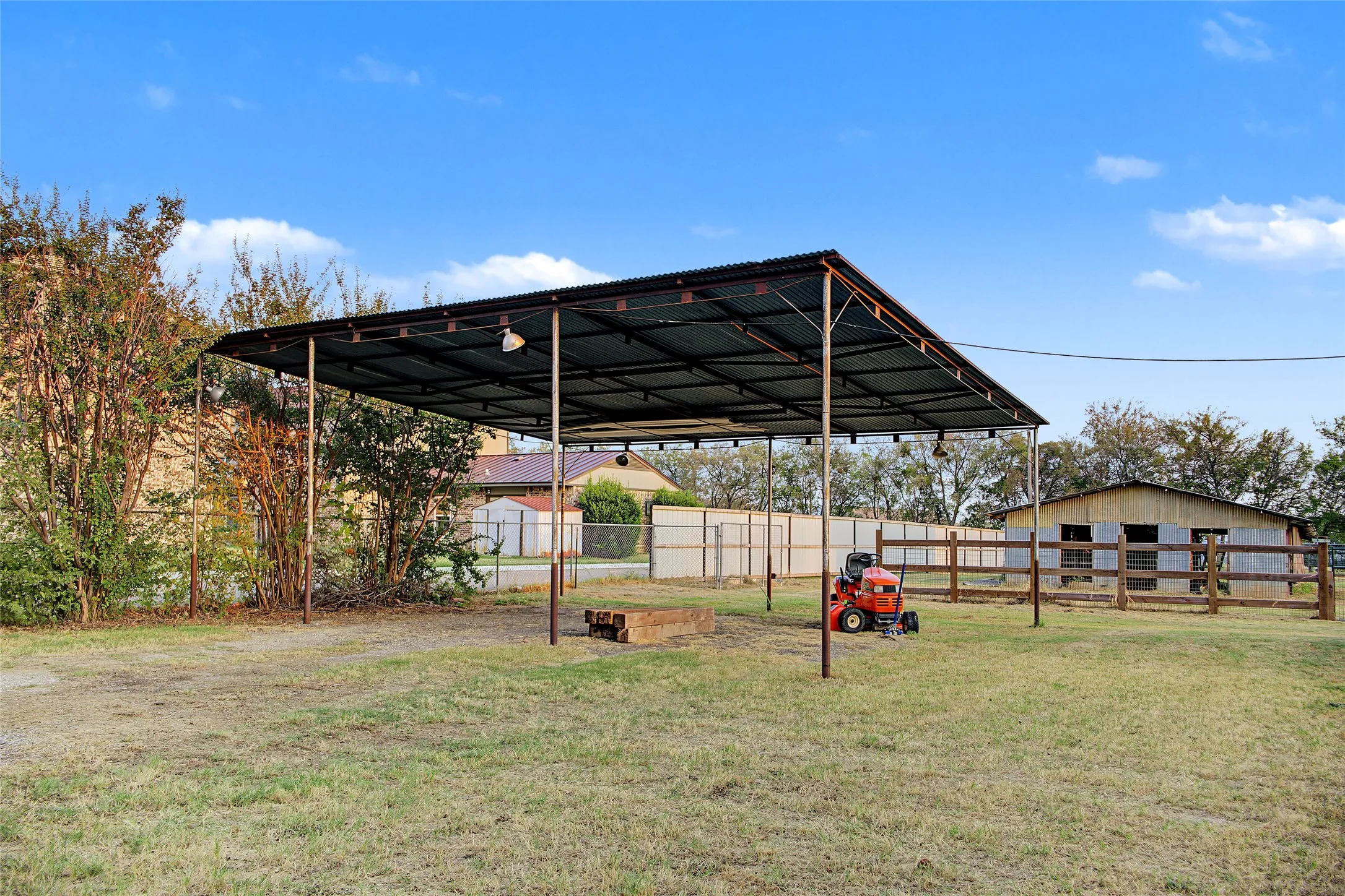 Expansive outdoor covered area with a corrugated metal roof