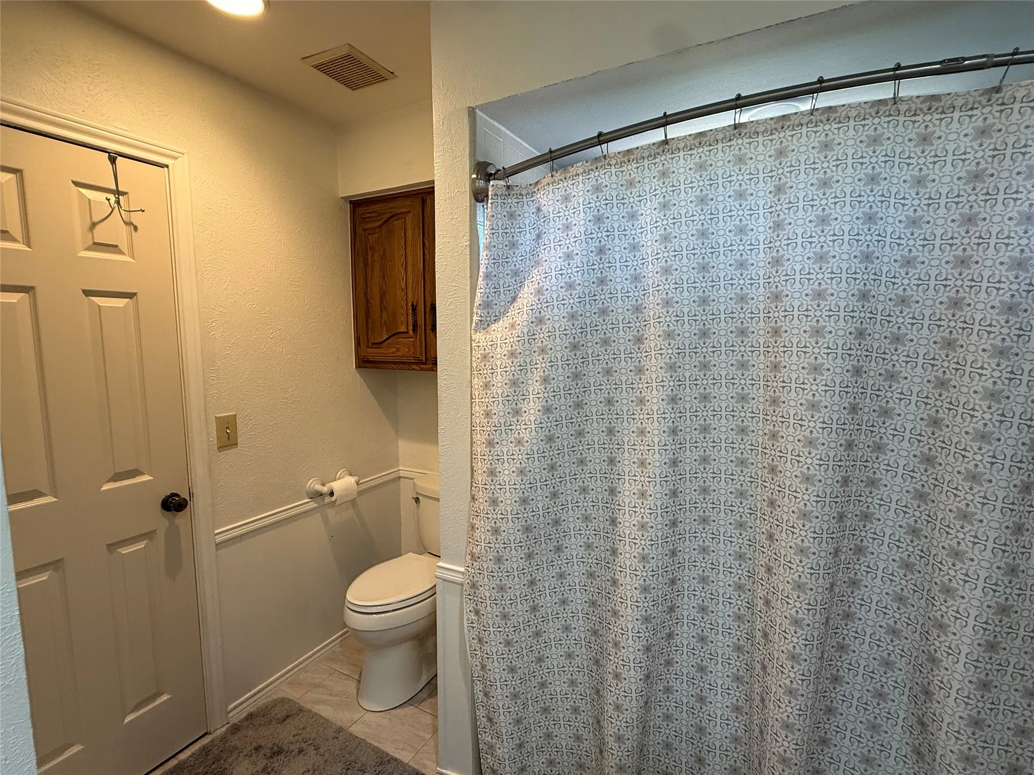 Bathroom with tub and shower