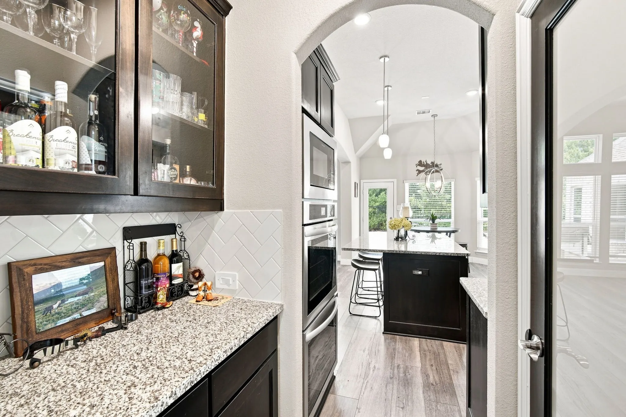 Butler's pantry between dining room and kitchen