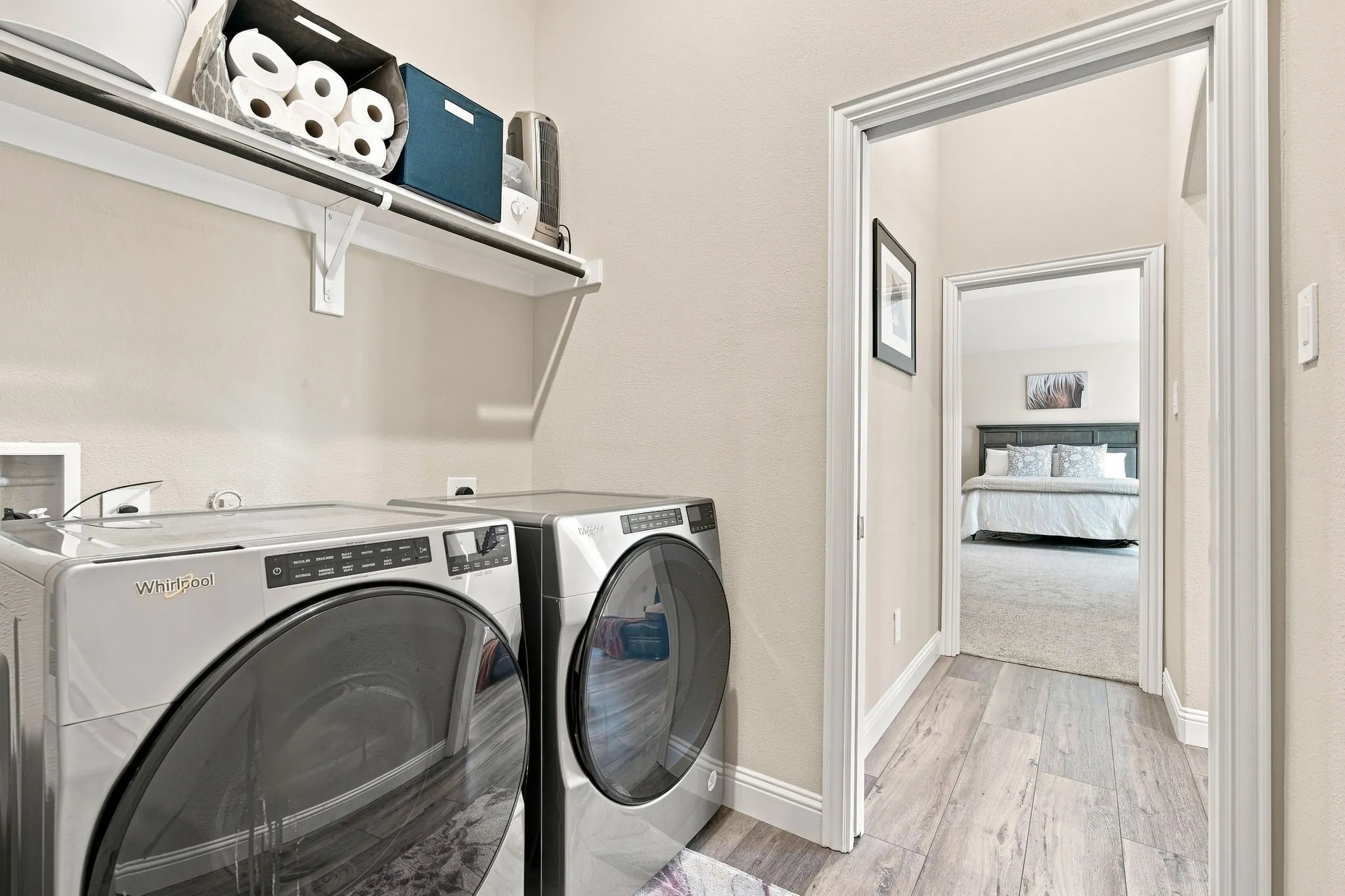 Laundry closes off with pocket doors in hallway