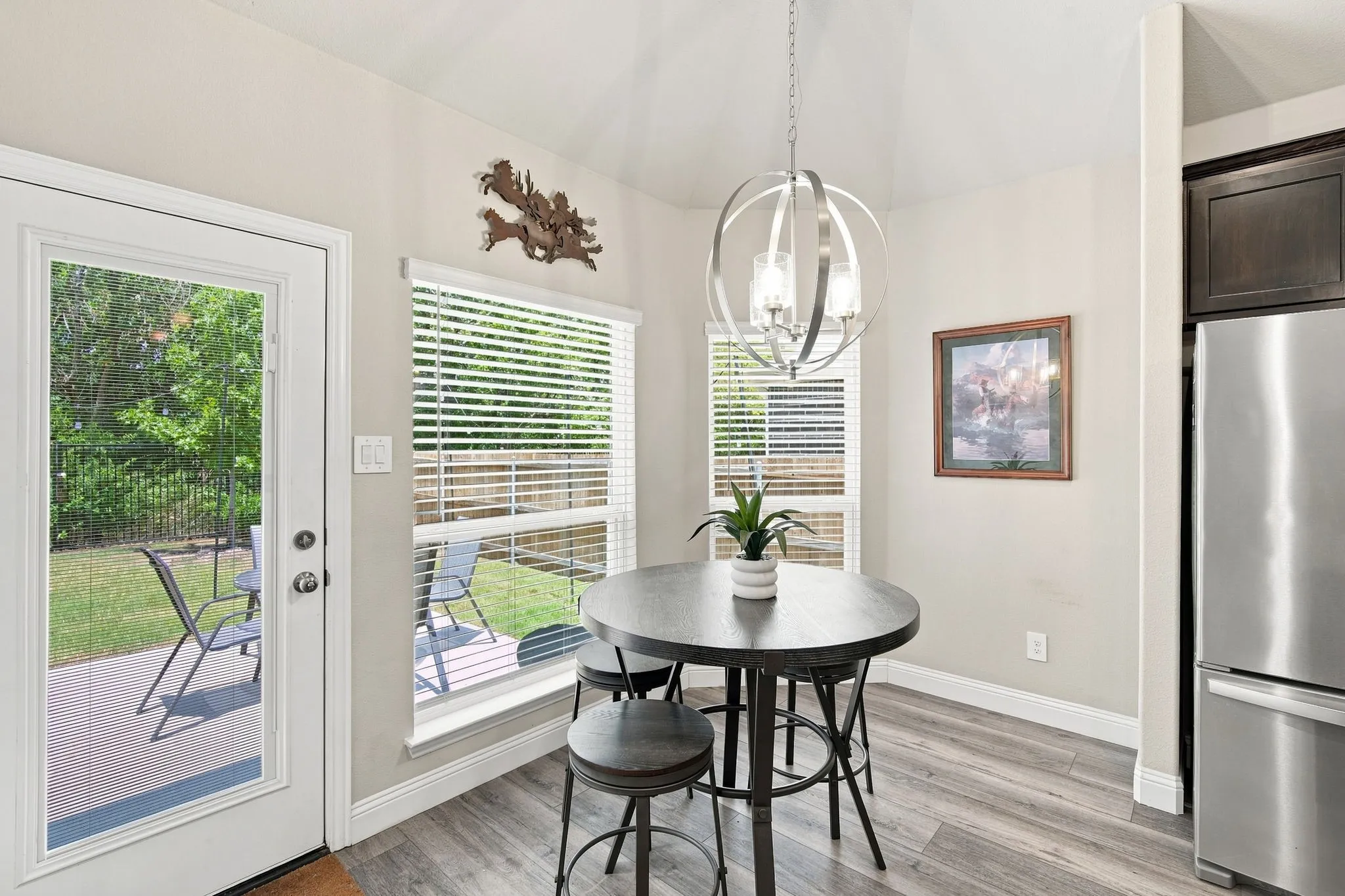 Breakfast nook overlooks backyard