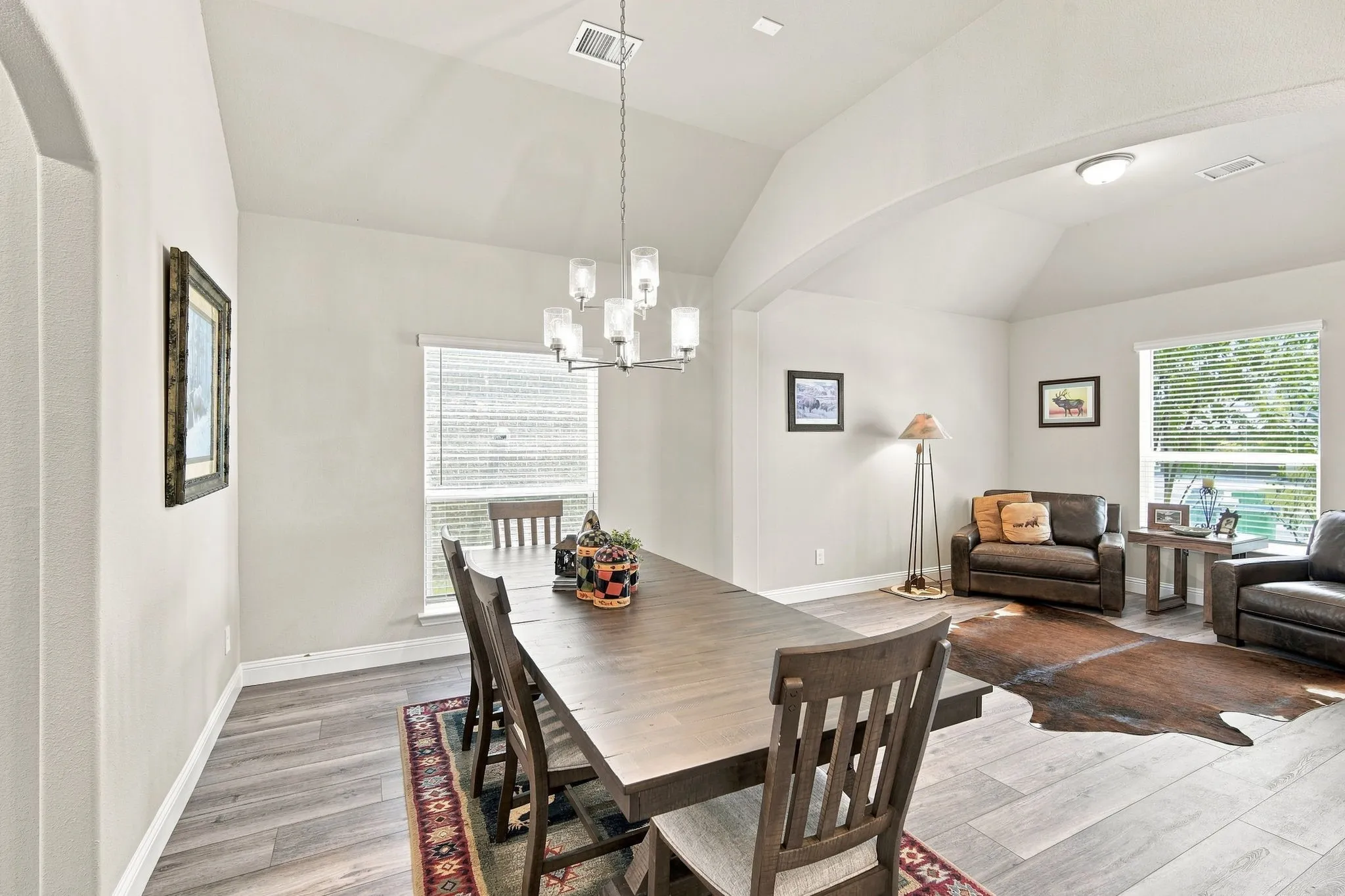 The dining area fits a large table with leaf