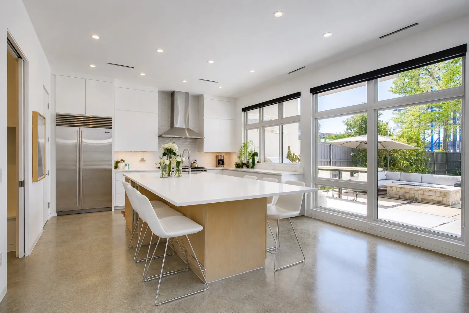 Stunning custom kitchen featuring Wolf Range and Sub Zero refrigerator.