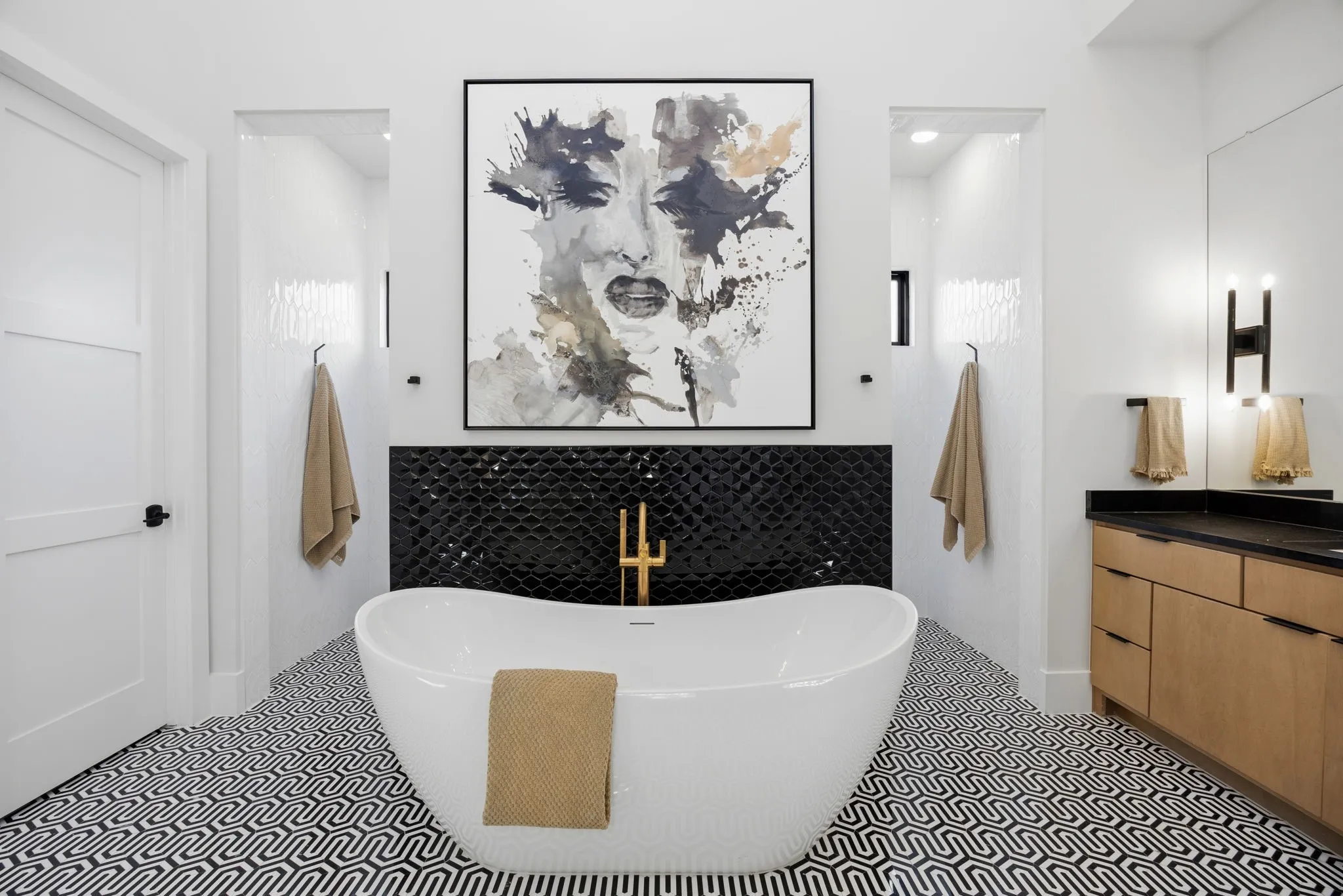 Primary beath features a "carwash" style shower with dual shower heads and a freestanding soaker tub