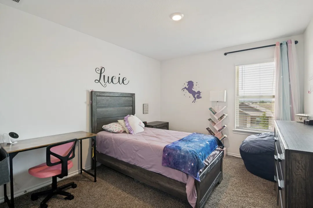 Recessed ceiling lighting, window with blinds, and neutral carpeting