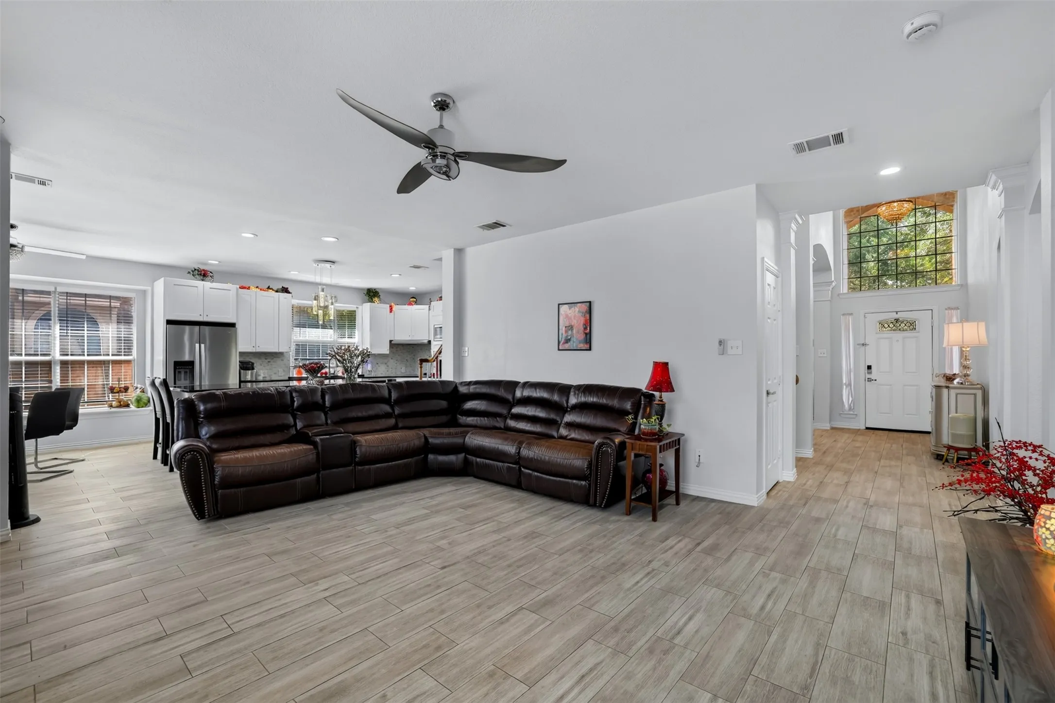 Oversized family room open to the unique kitchen.