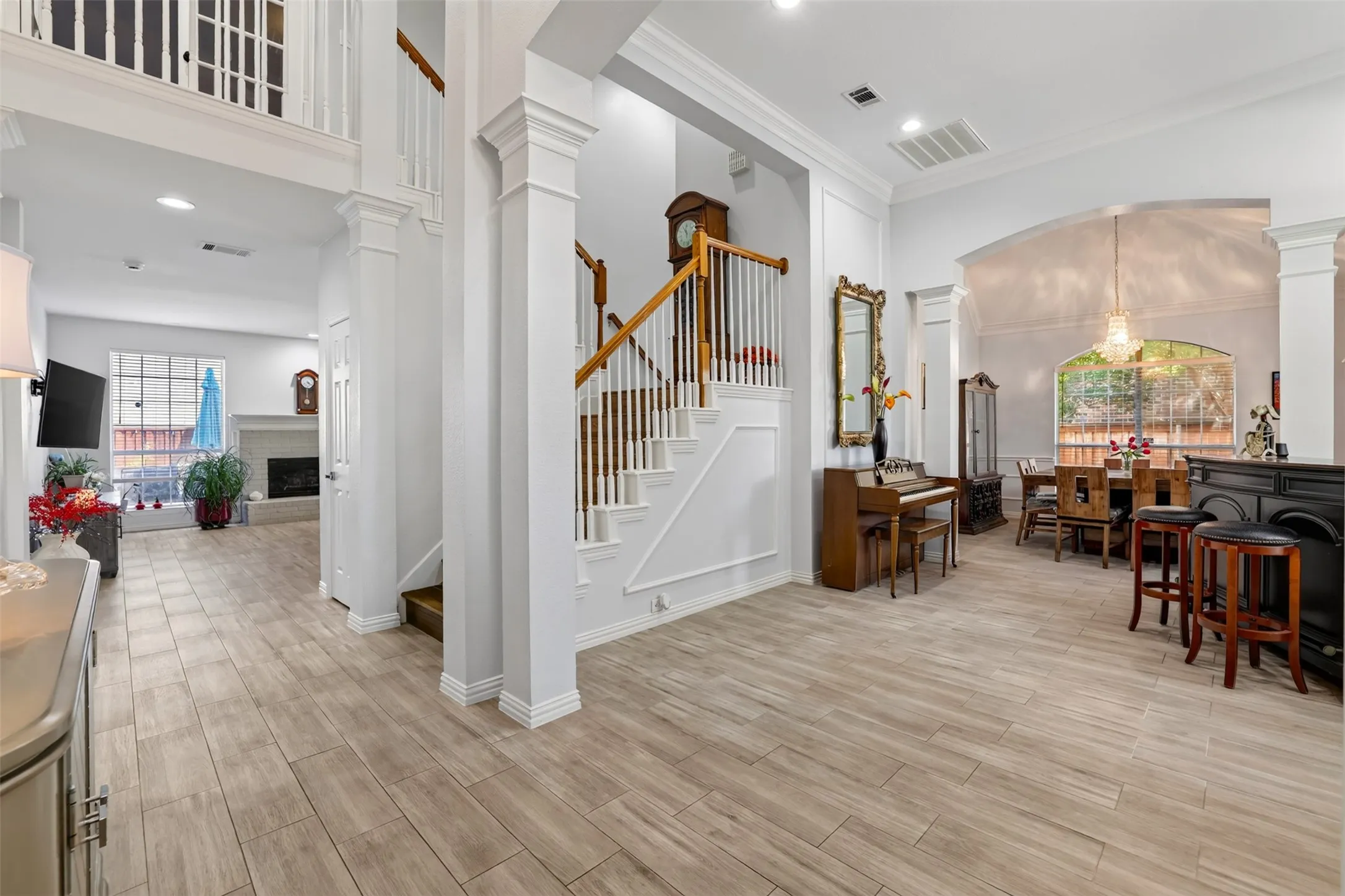 Grand entry welcomes you with soaring ceilings and abundant natural light.