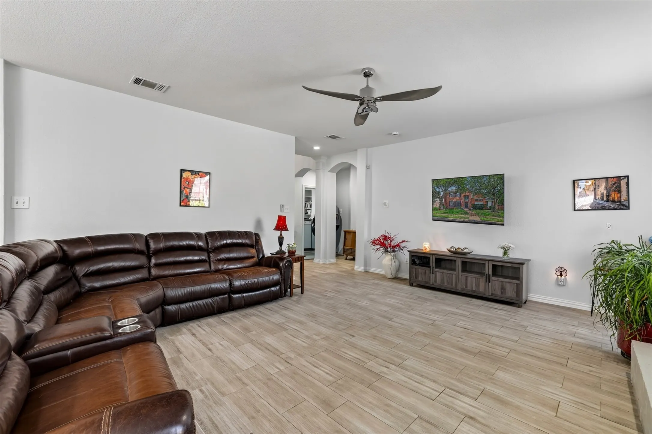 The open floor plan allows the cook to stay connected with family and guests while preparing meals.