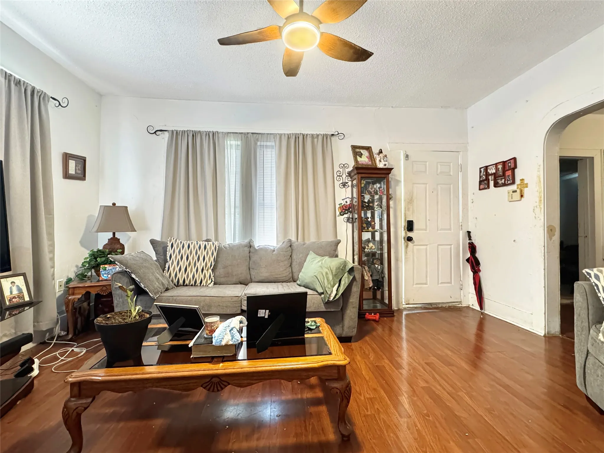 Wood-finish flooring throughout the space
