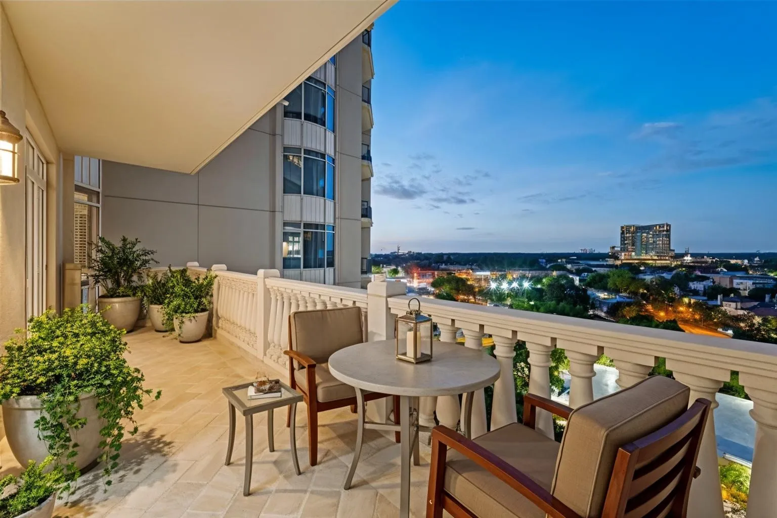 Balcony shared by living room and second bedroom (virtually staged)