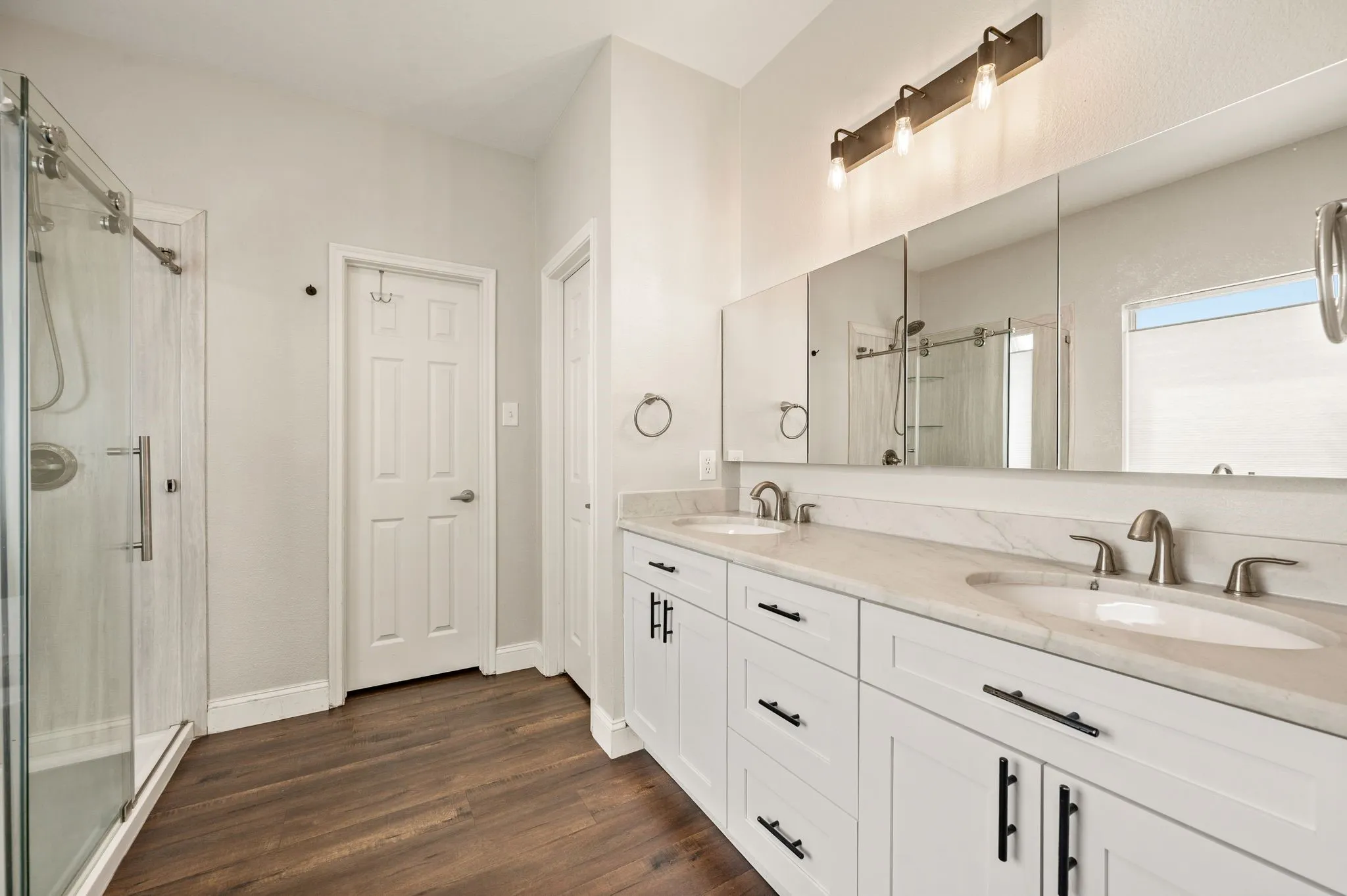 Updated Primary Bathroom w/custom closet.
