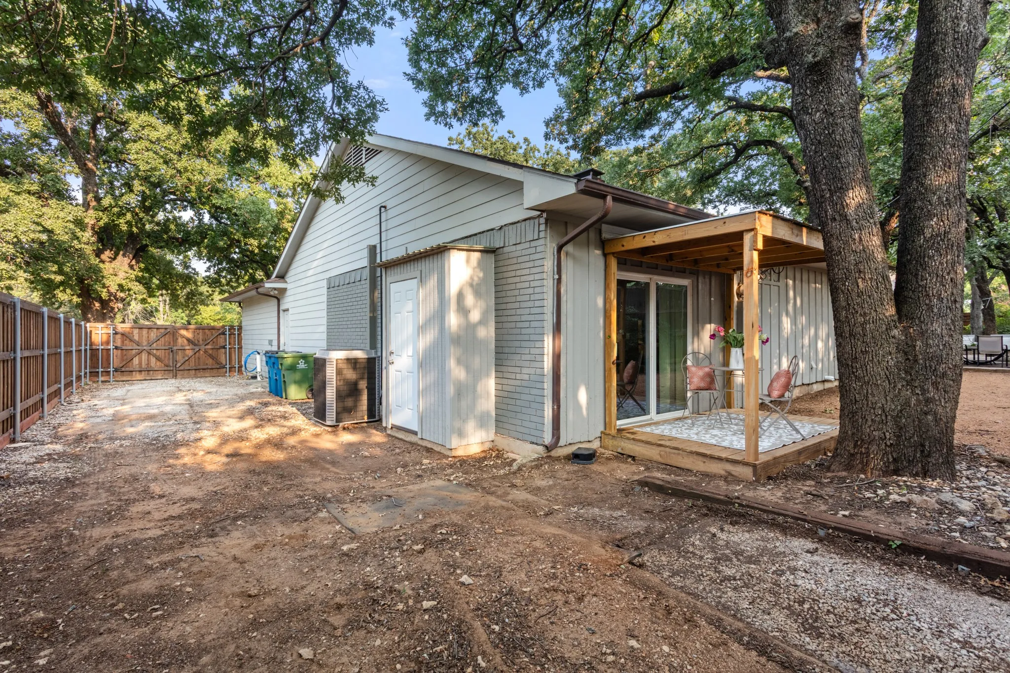 Step outside and enjoy multiple places to relax including extensive front porch areas, covered back patio and open patio all overlooking a peaceful backyard surrounded by a 6 and 8-foot cedar fence. A gated side yard provides RV or boat parking while mature trees create beauty shade and privacy throughout the property.