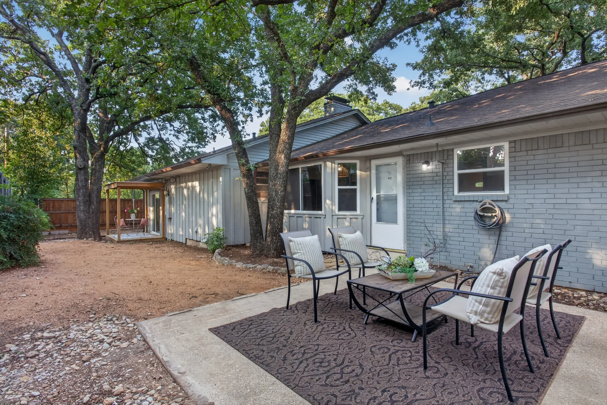 Step outside and enjoy multiple places to relax including extensive front porch areas, covered back patio and open patio all overlooking a peaceful backyard surrounded by a 6 and 8-foot cedar fence. A gated side yard provides RV or boat parking while mature trees create beauty shade and privacy throughout the property.