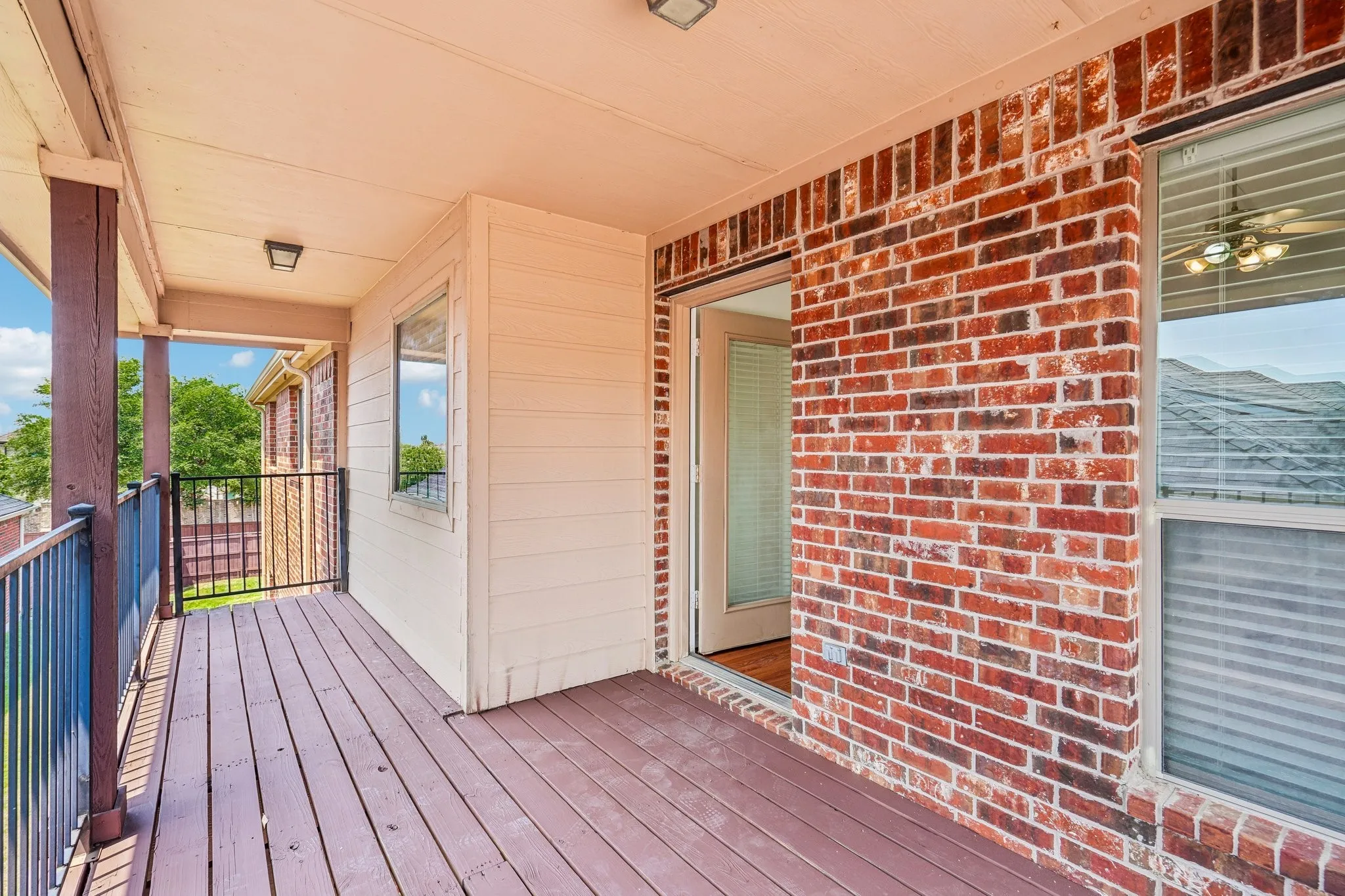 Spacious covered balcony  right off the Primary Bedroom offering a private outdoor retreat with plenty of room for seating, relaxing, and enjoying the fresh air.