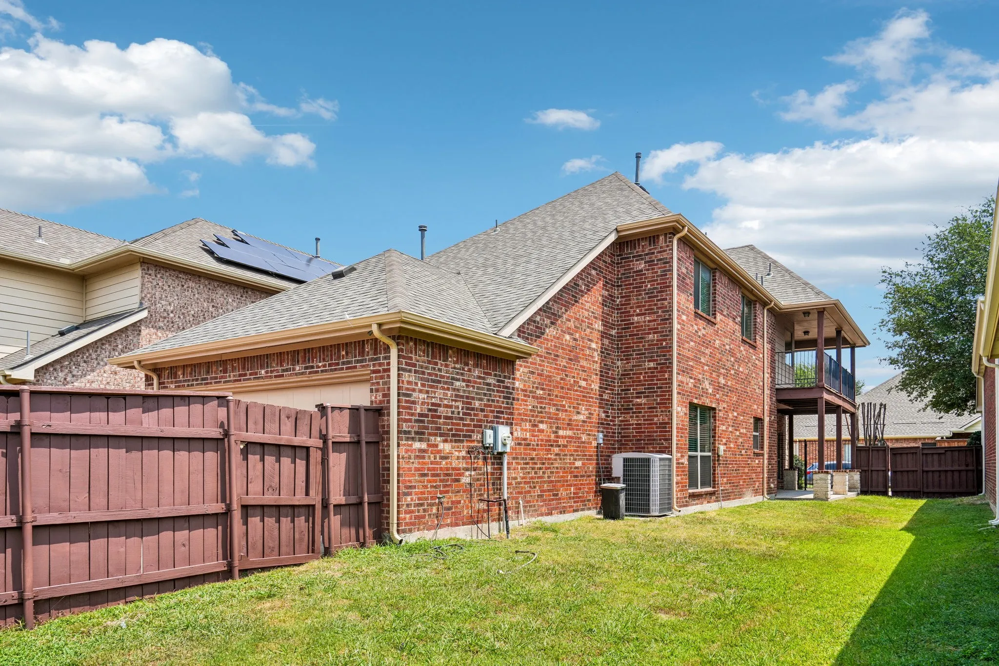 Spacious, fully fenced side yard offering ample outdoor space for entertaining, play, gardening, or creating a private retreat.