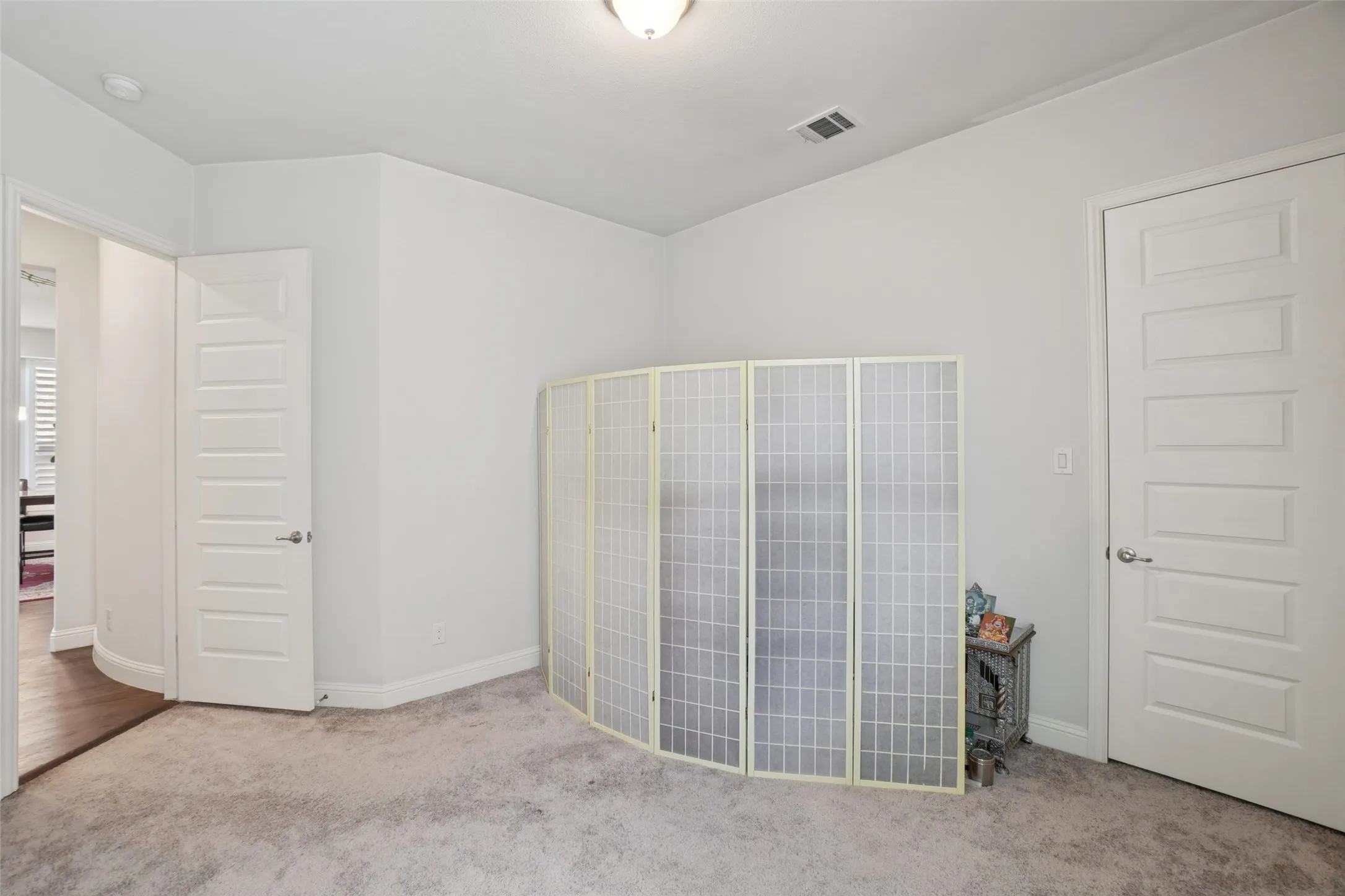 Unfurnished bedroom featuring carpet floors