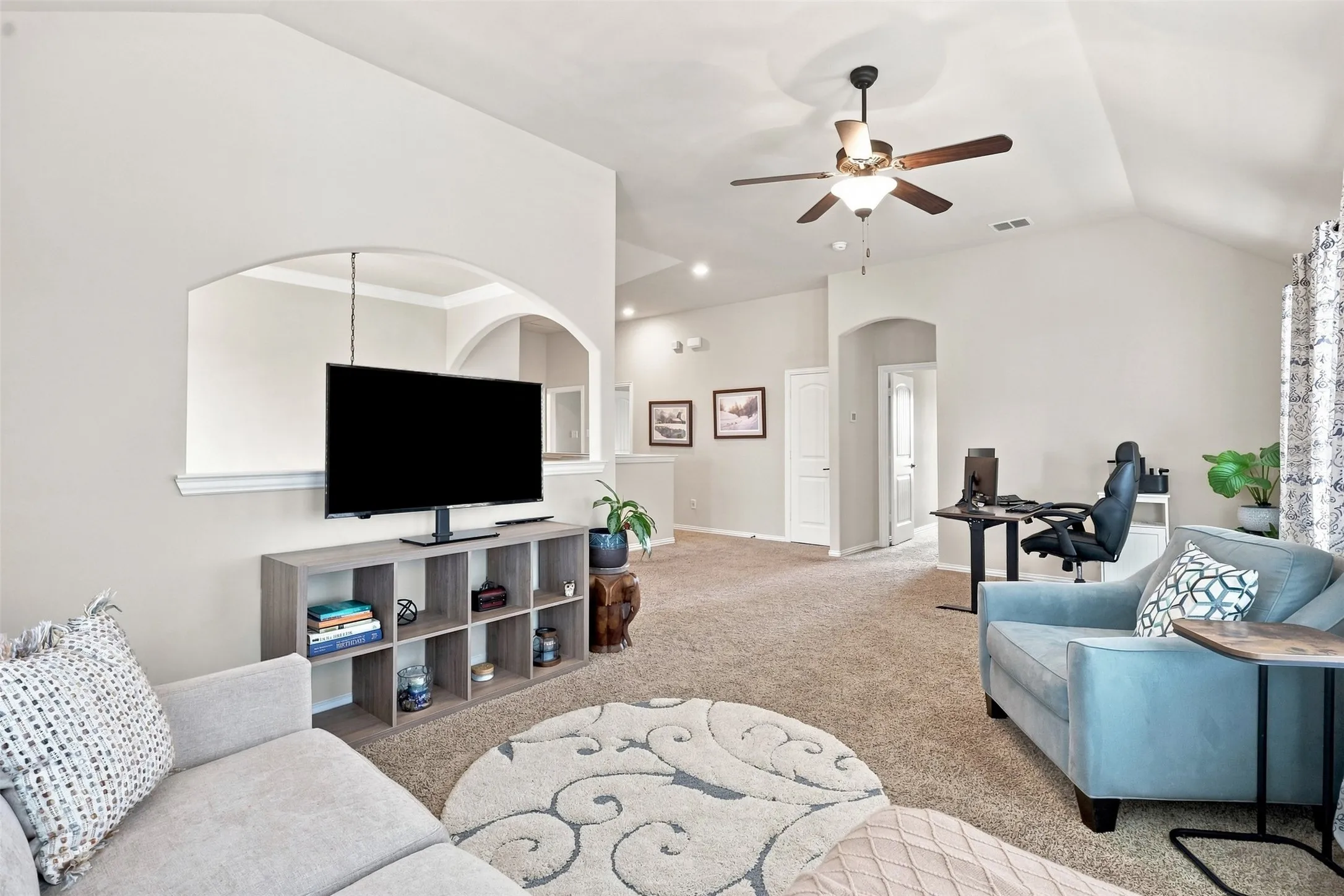 Secondary Living Area on Second Floor with Vaulted Ceilings.