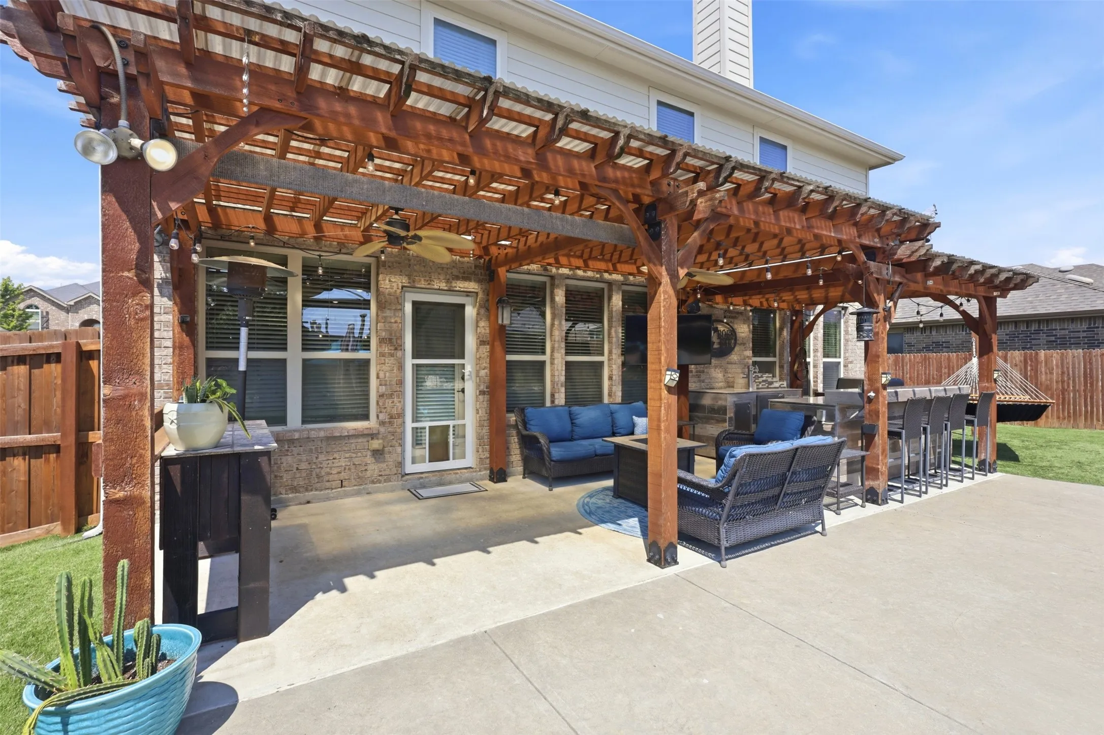 Outdoor Retreat features Flood Lights and Additional Prep Bar.