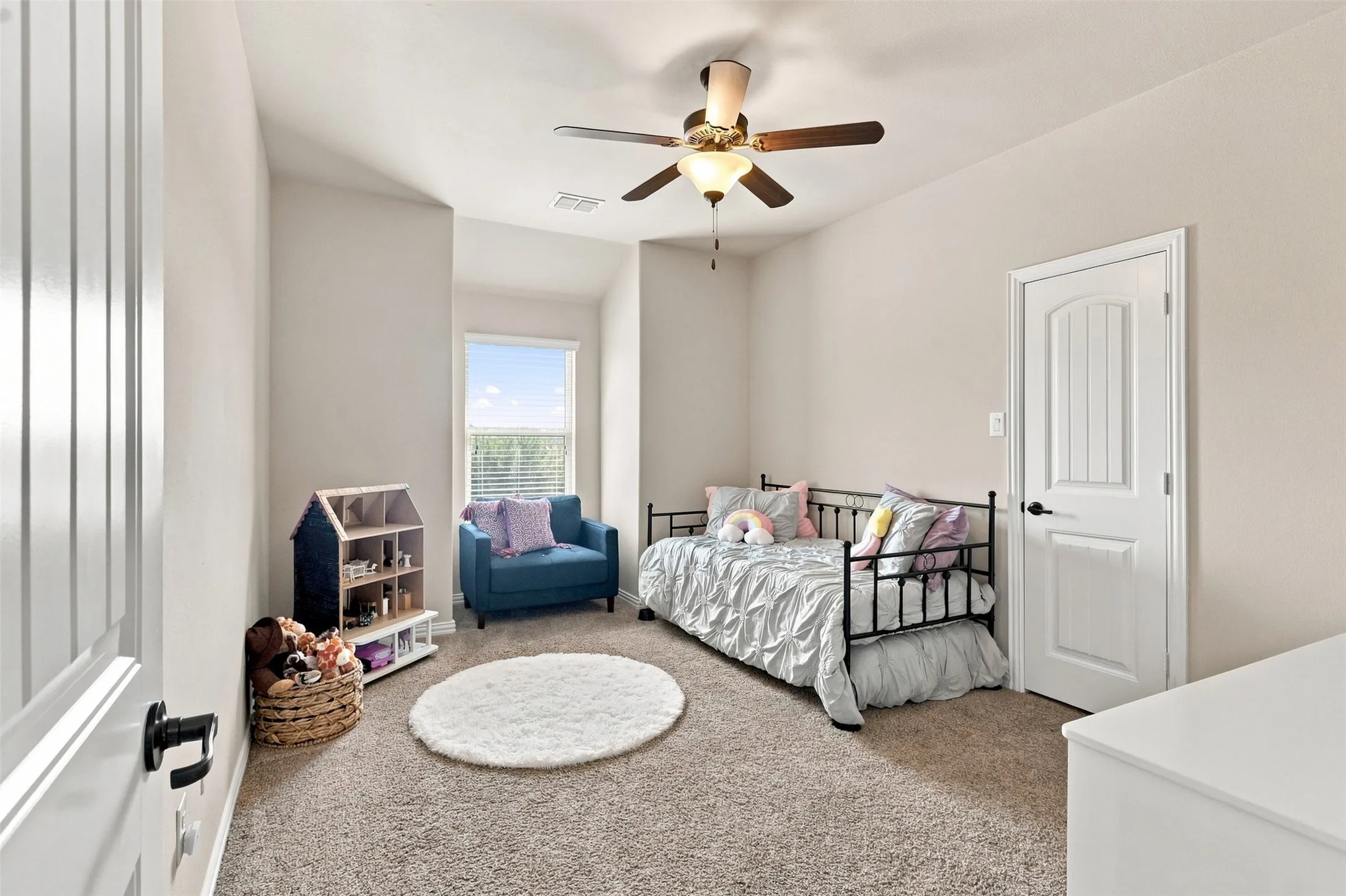 Bedroom 2 with Charming Dormer Window and Walk-in Closet.