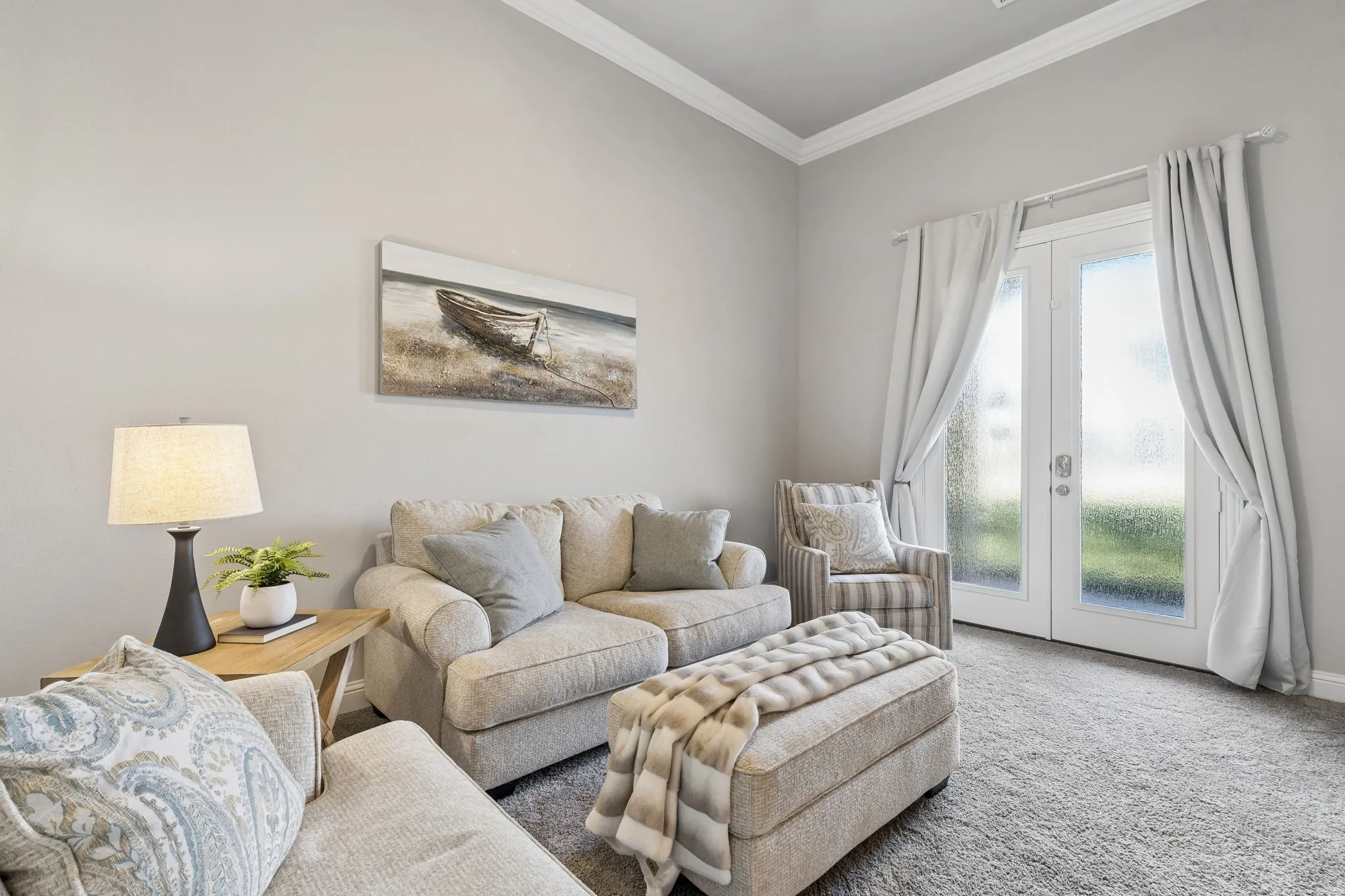 Office with doors to exterior. Sellers using as a sitting room.
