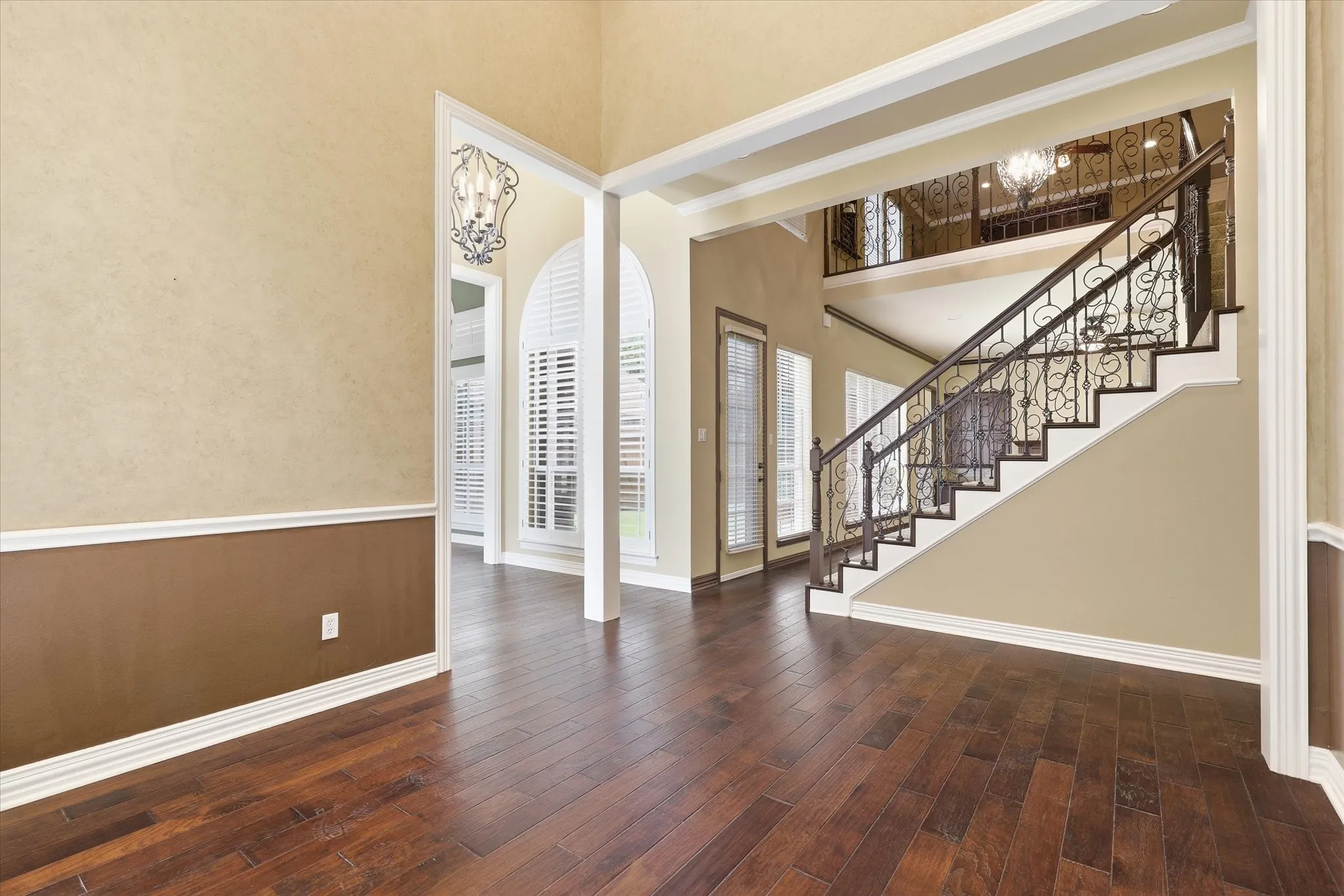 The formal dining room is just steps away from the kitchen and can easily be used as a flex space for a library,  sitting room, or to display your baby grand piano.