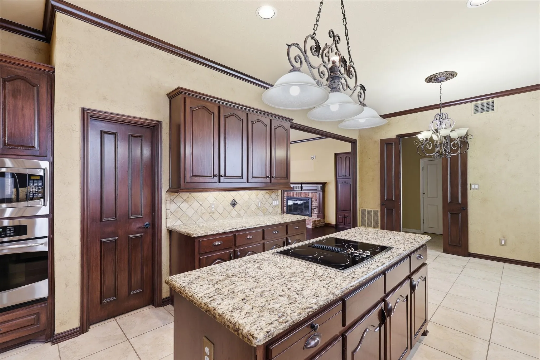 A closer look at the kitchen's generous storage and work areas.