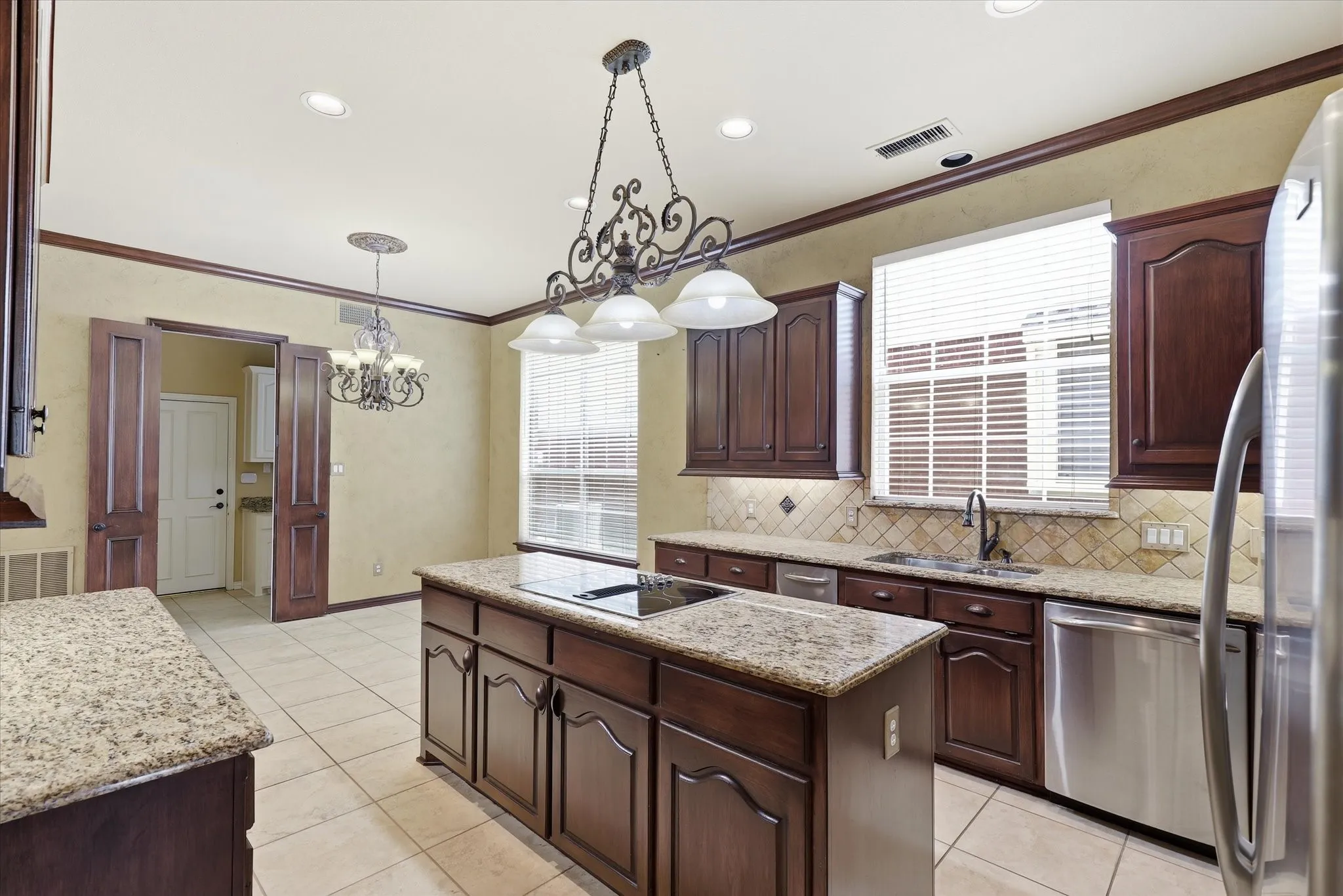 Looking toward the breakfast area, you'll appreciate the natural light and easy flow for entertaining.
