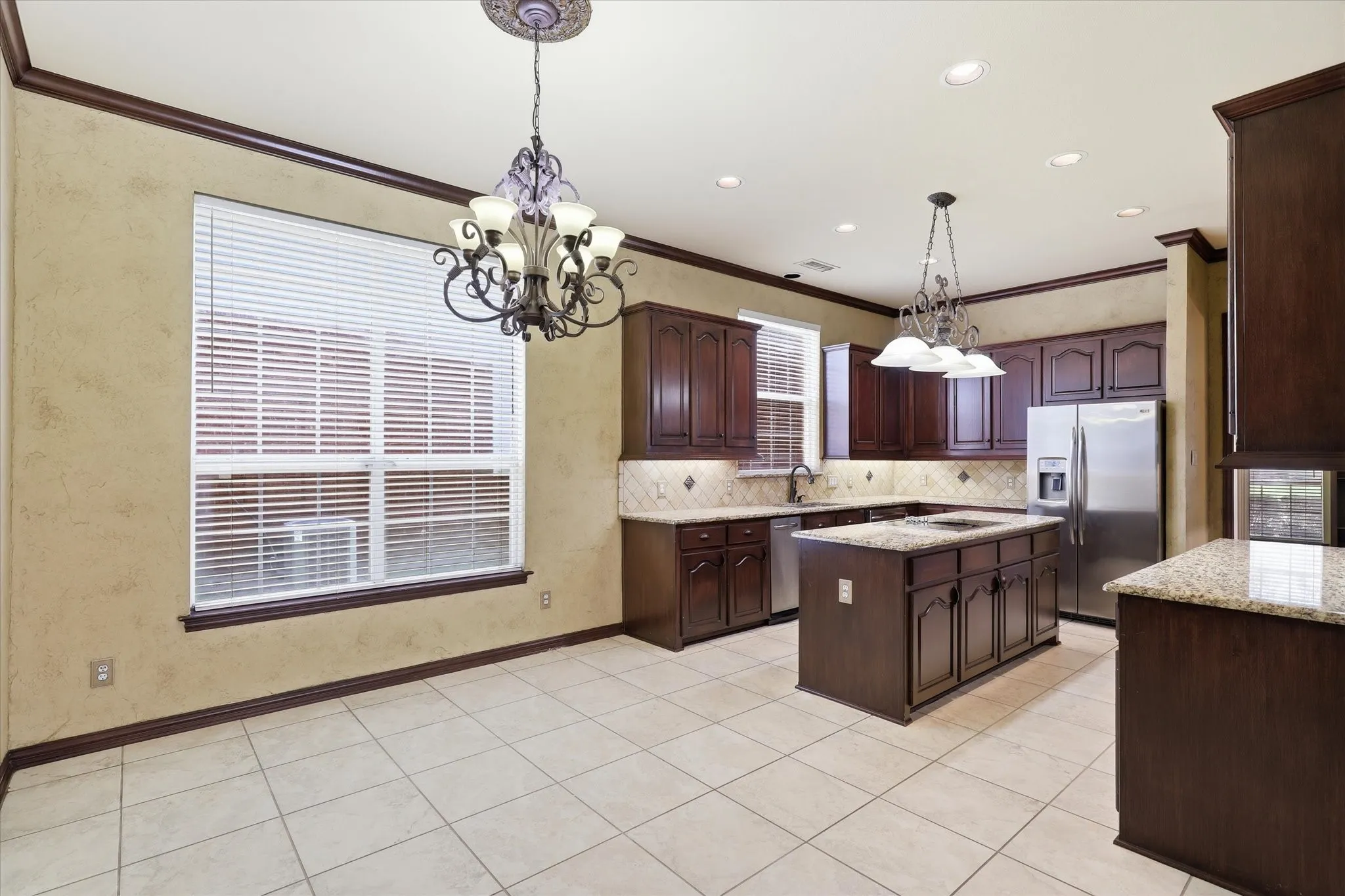 The spacious kitchen features abundant cabinetry, generous countertop space and a functional layout for everyday​​‌​​​​‌​​‌‌​‌‌​​​‌‌​‌​‌​‌​​​‌​​ living.