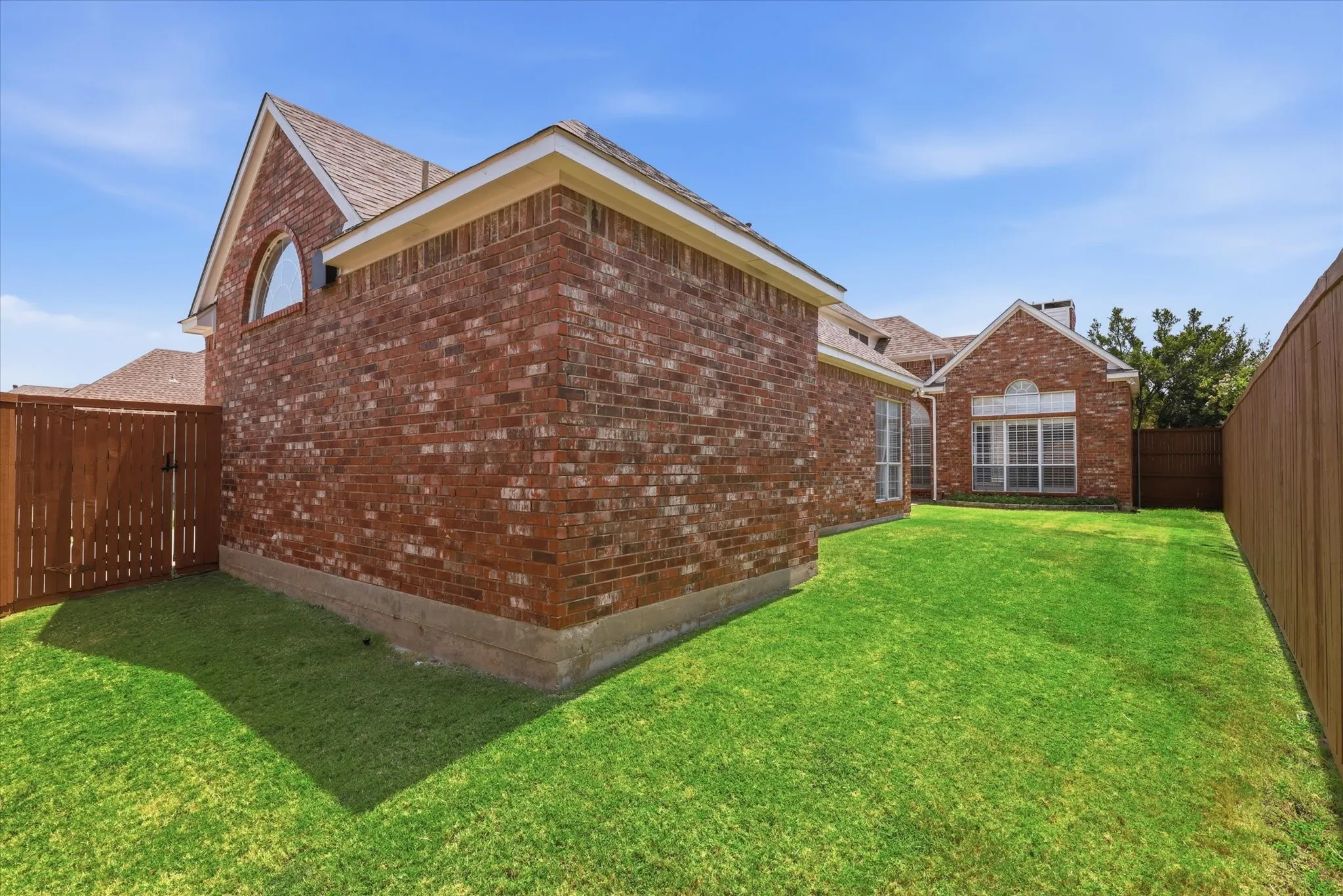 The backyard provides room to relax, play or entertain while remaining easy to maintain.