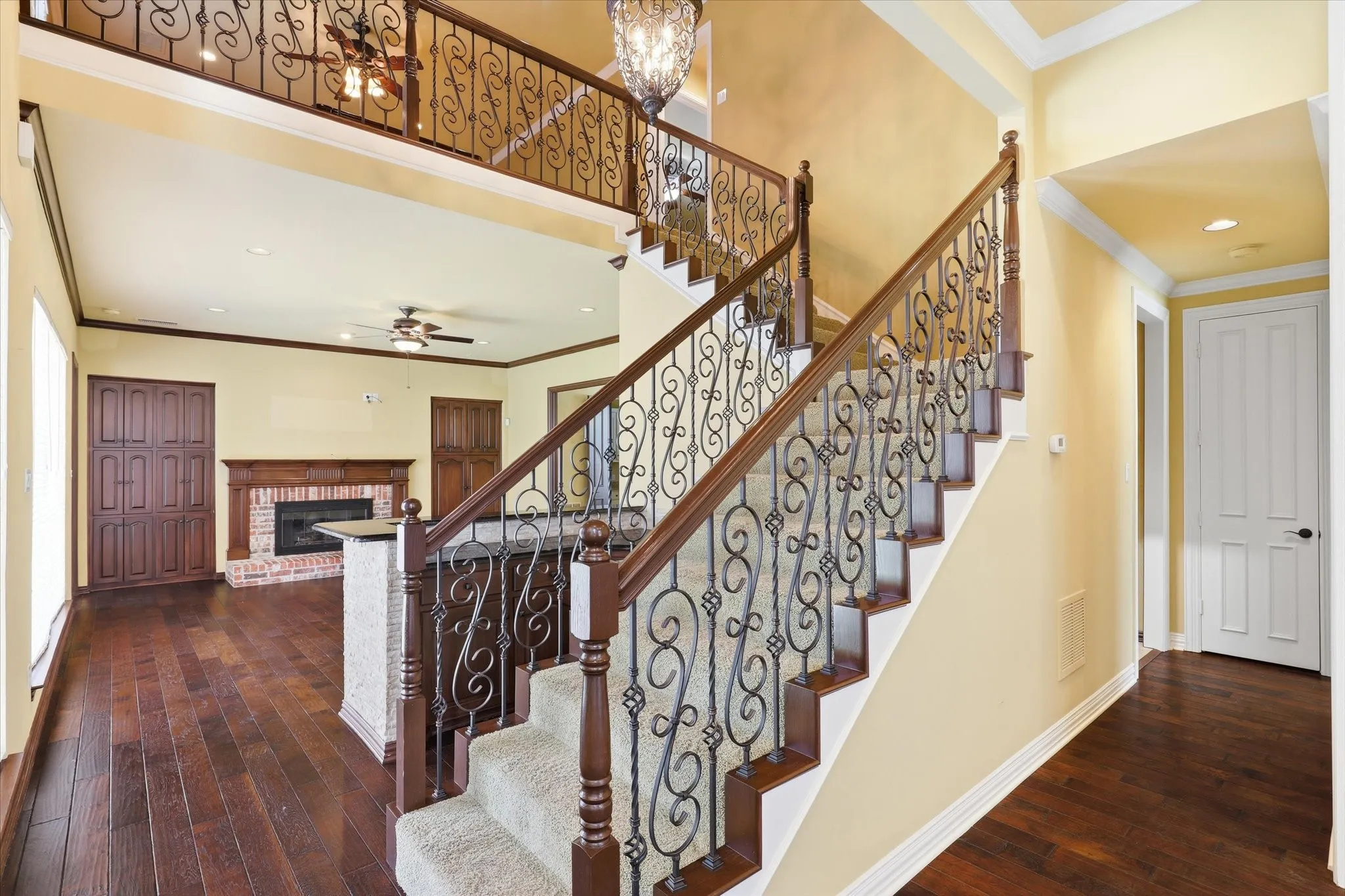 Another view of the elegant staircase and welcoming entry.