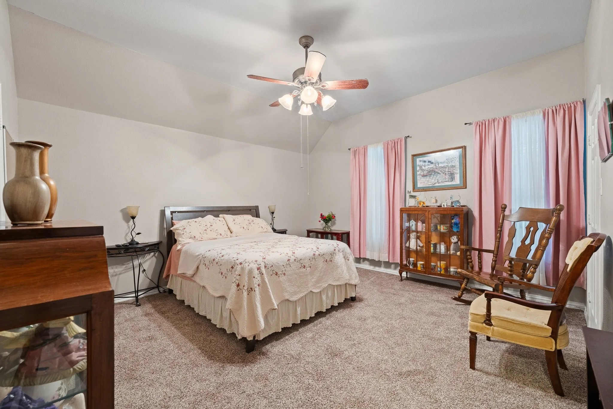 UPSTAIRS 2nd Primary Bedroom features ENSUITE Full Bath, carpeting, a ceiling fan, and multiple windows. 4 Bedrooms are Upstairs AND there's 2 Full Baths!