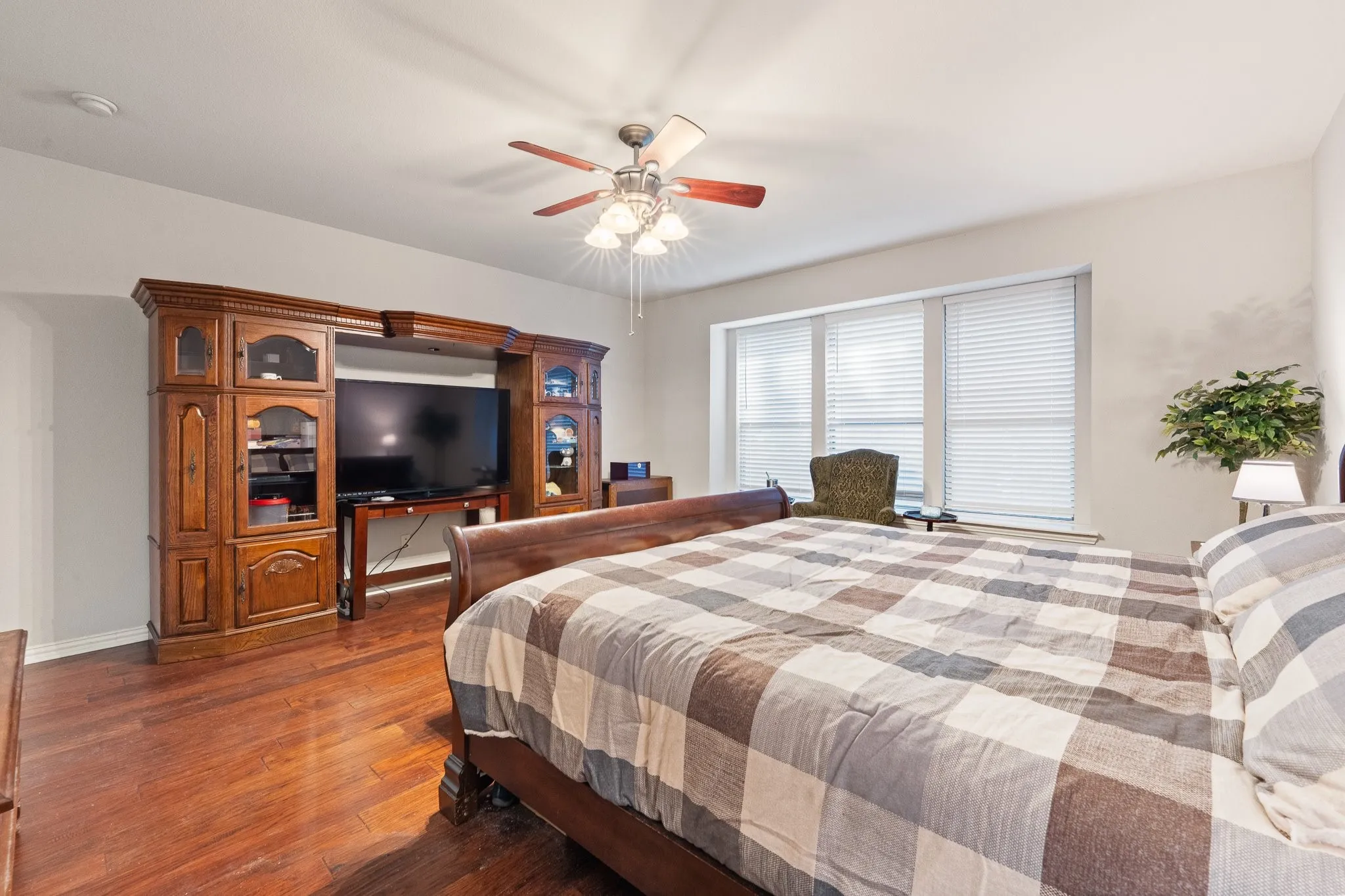 DOWNSTAIRS Primary Retreat is not only privately split from others... it features a great ENSUITE Bath with DUAL Vanities and a Walk-In Closet!