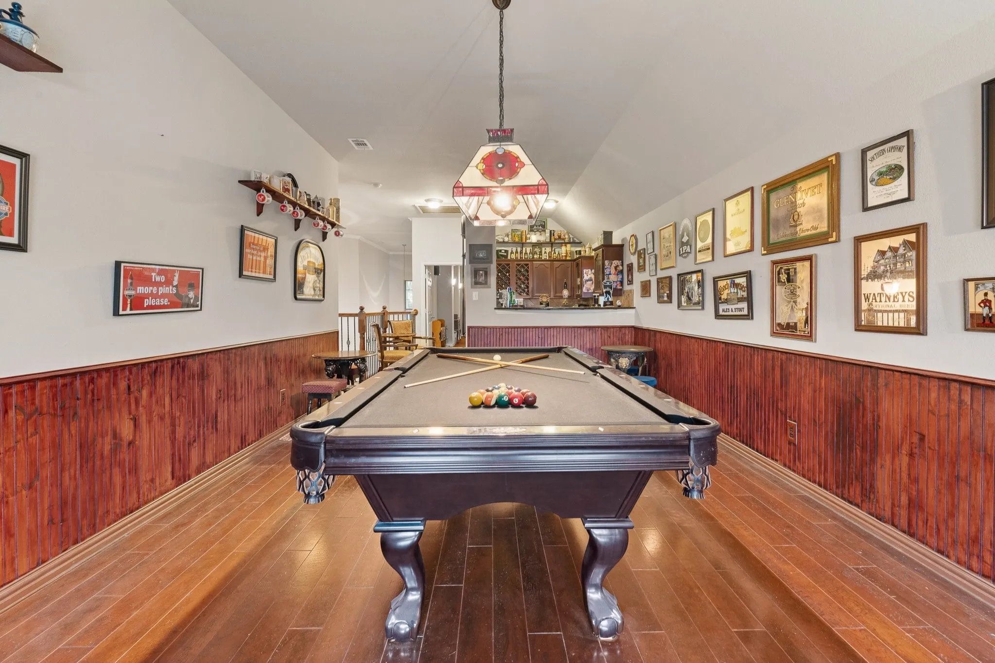 Upstairs Game Room opens to WET BAR, perfect for entertaining... Media Room is also nearby!!