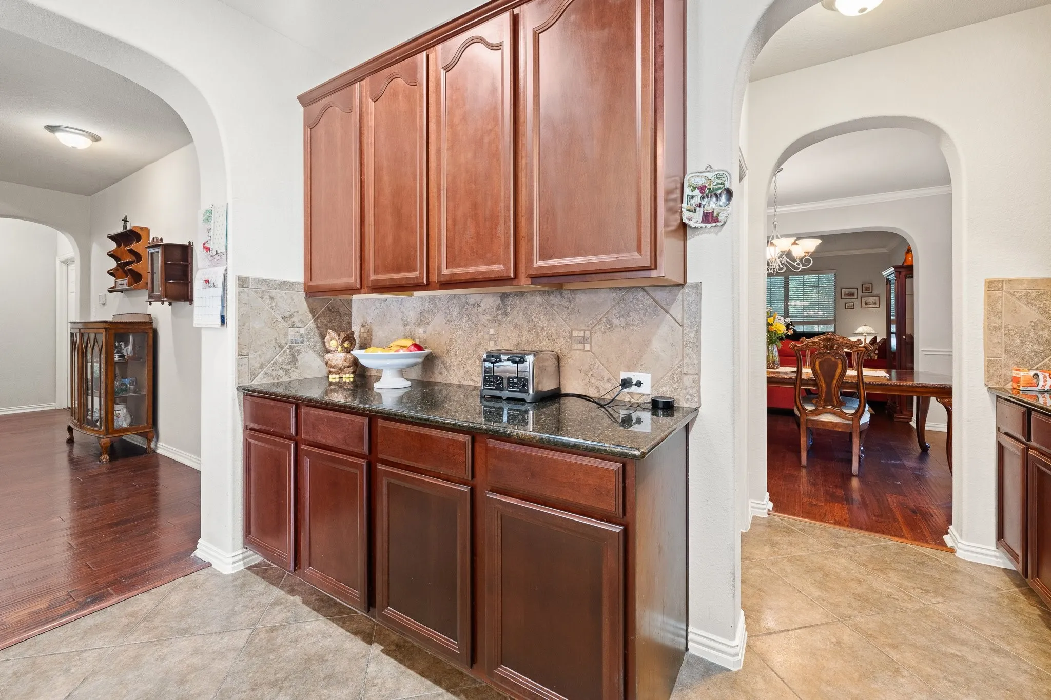 Kitchen DRY Bar is located by Butler's Pantry and Large WALK-IN Pantry...