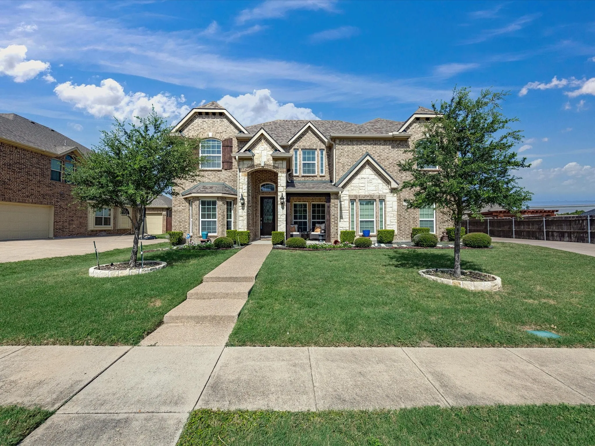 Brick and stone exterior with gabled roof lines