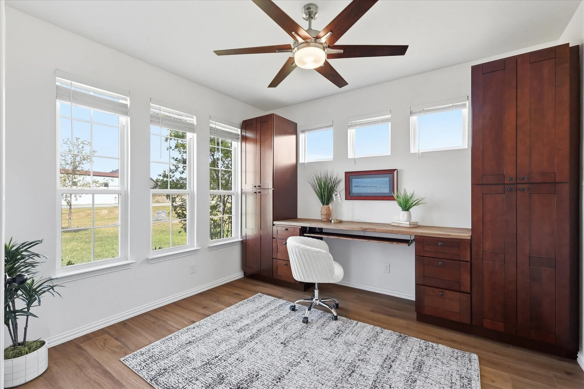 The desk and cabinets stay