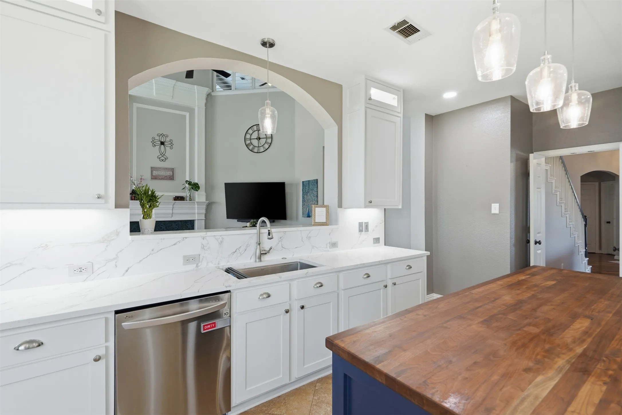 The kitchen is open to the living room.