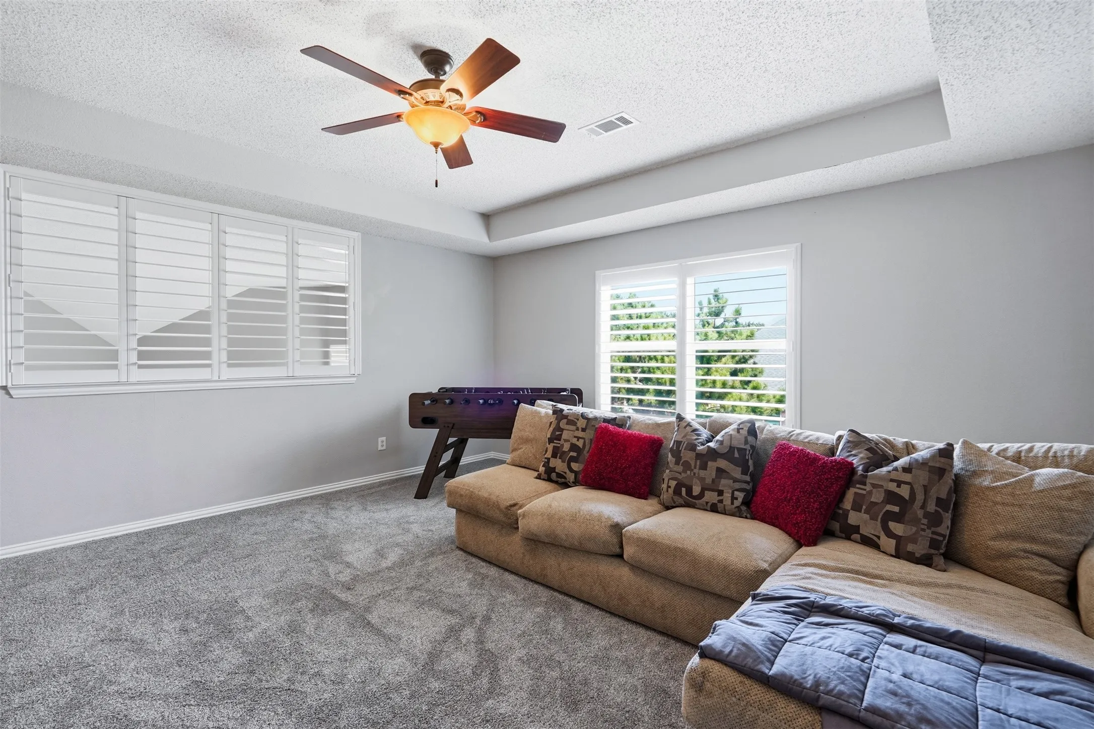 The gameroom overlooks the expansive backyard.