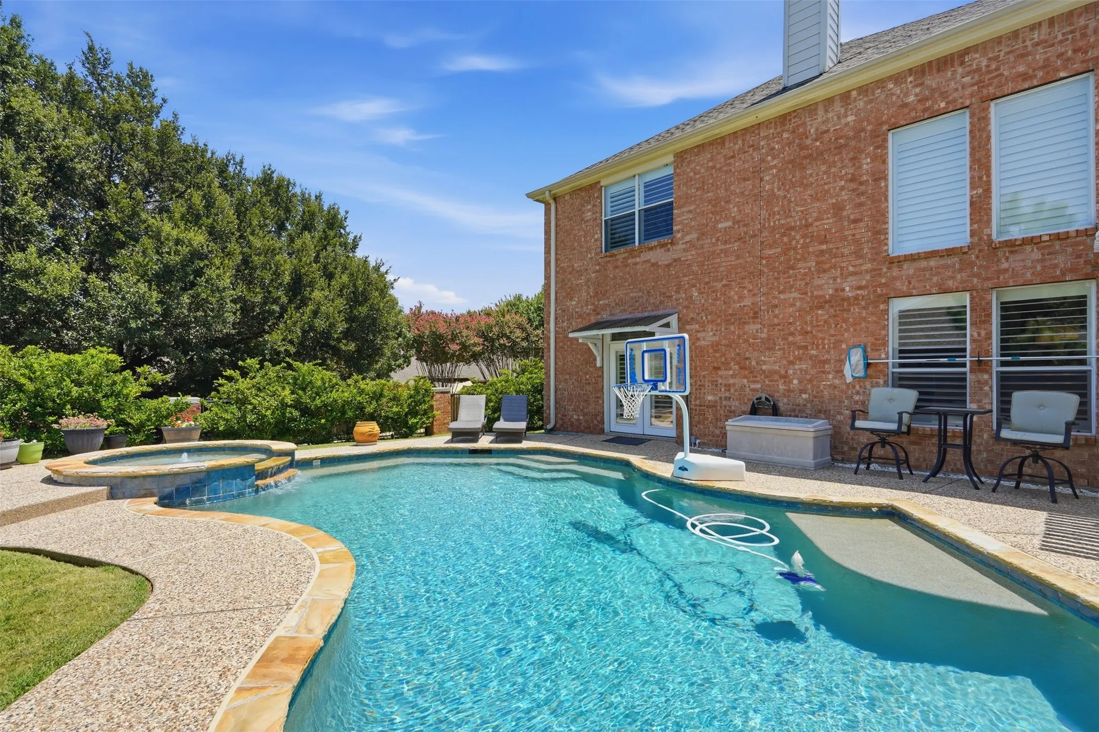 Relax in the saltwater pool with attached spa.