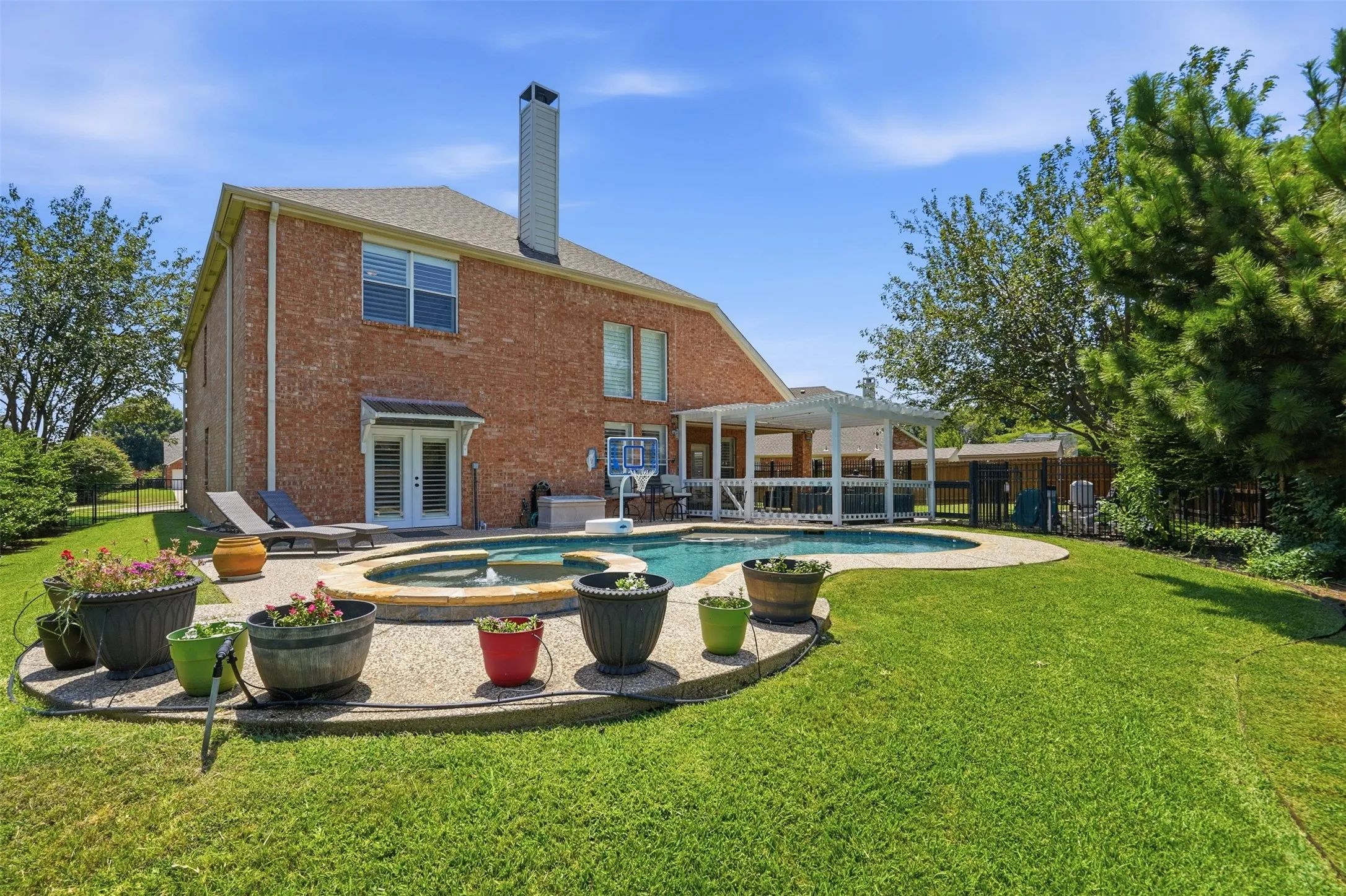The backyard has plenty of extra space for playtime or to garden.