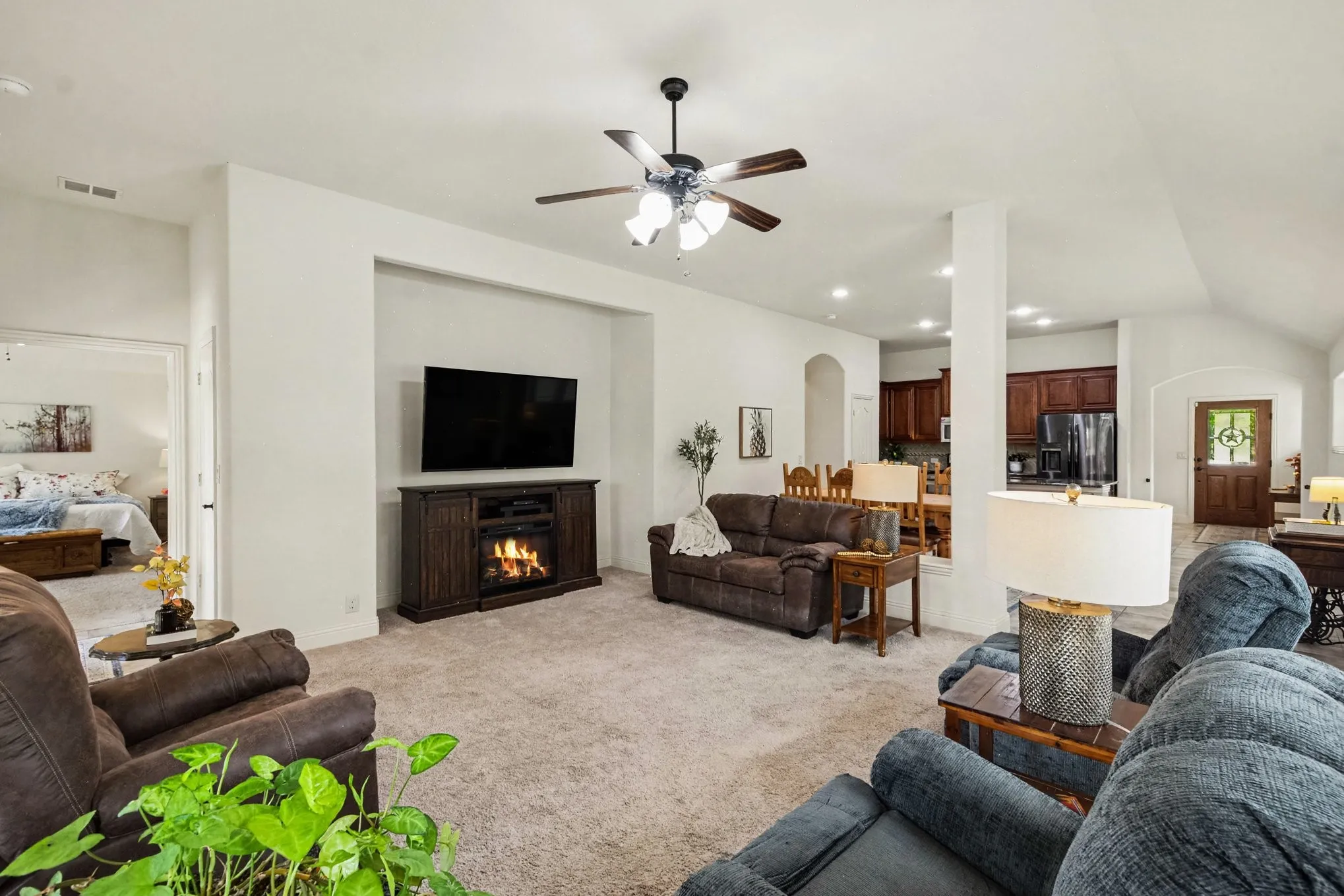 Recessed wall niche with a built-in fireplace