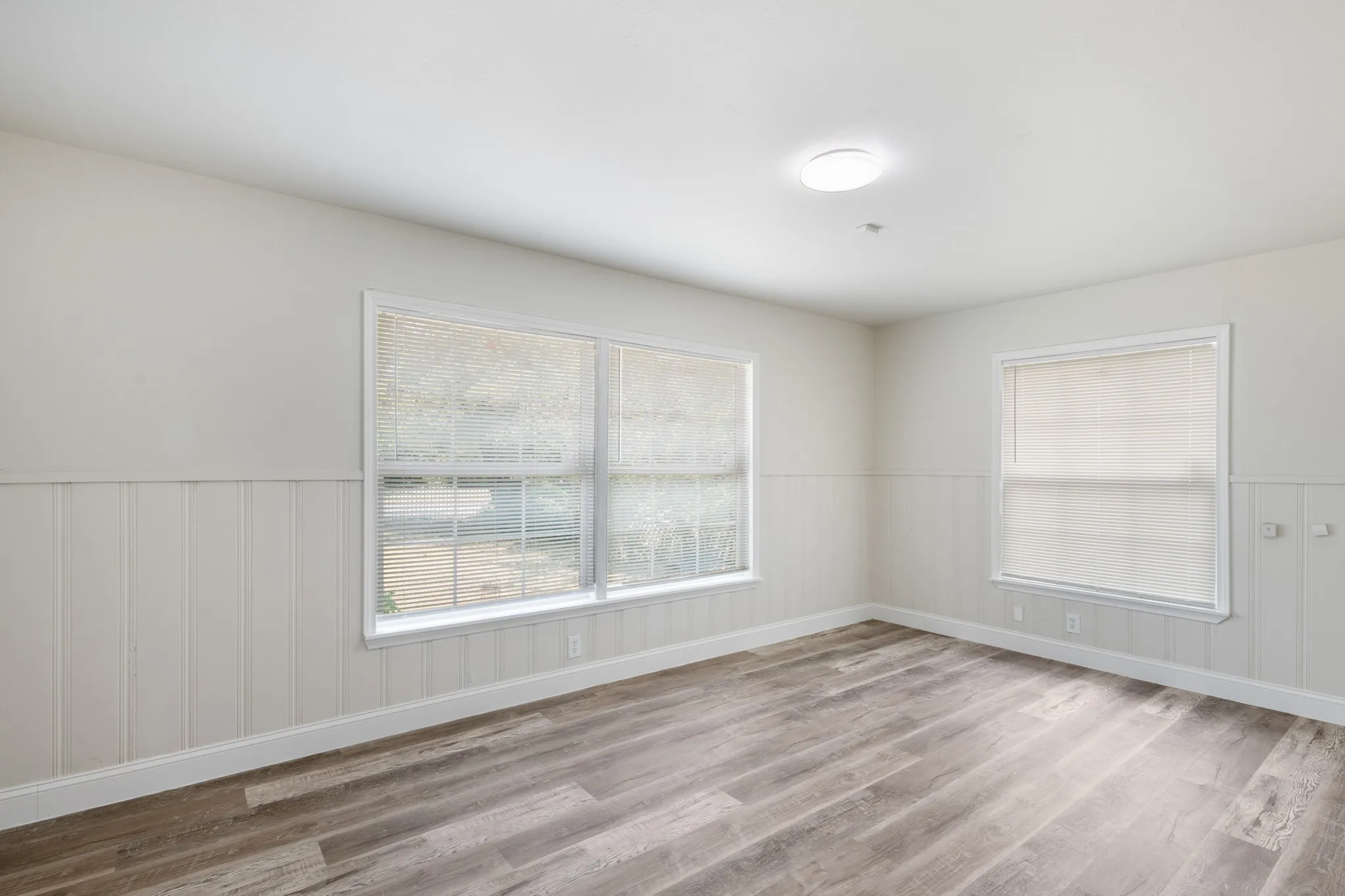 There are 2 primary bedrooms, that are split floorplan.