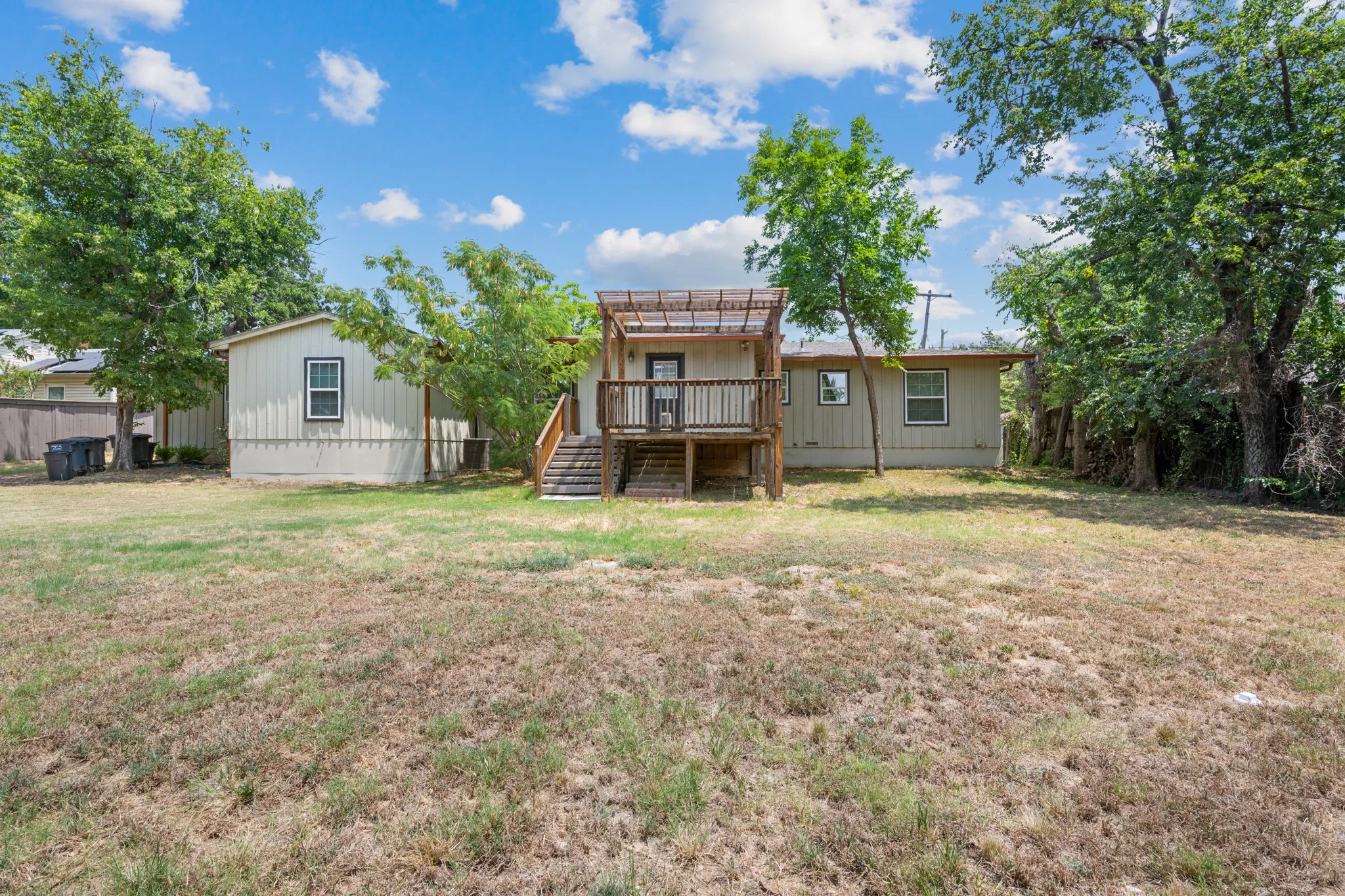 So much space in backyard for play or relaxing.